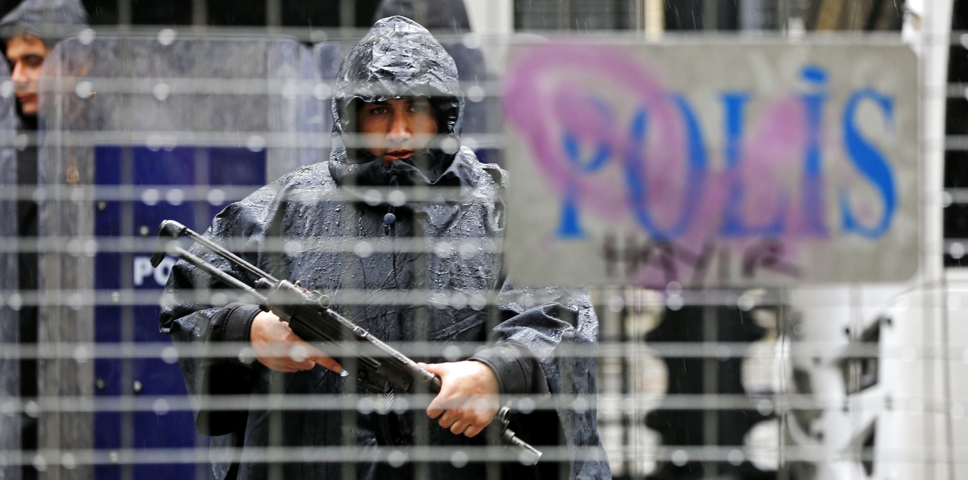 epa05928380 (FILE) - Turkish armed riot police guard as supporters of Turkish President Recep Tayyip Erdogan shout slogans against the Netherlands in front of the Dutch Consulate in Istanbul, Turkey, 12 March 2017 (reissued 26 April 2017). According to reports on 26 April 2017, Turkey has conducted raids across the country, one of the largest operations in months, arresting over 800 people suspected of being connected to the movement loyal to US-based Islamic cleric Fethullah Gulen that lead to a failed coup in July 2016.  EPA/CEM TURKEL
