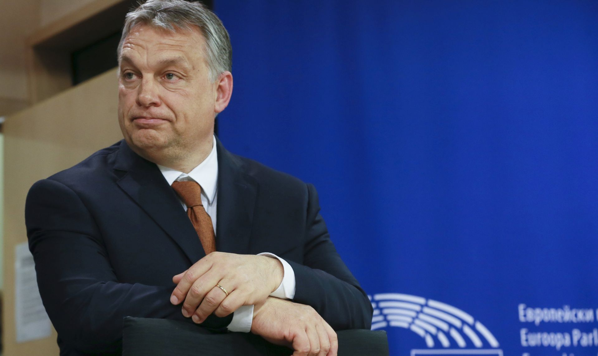 epa05929118 Hungarian Prime Minister Viktor Orban gives a press briefing after a hearing at the plenary session of the European parliament in Brussels, Belgium, 26 April 2016. Session will focus on the situation in Hungary, including legislative measures that could force the closure of the Central European University in Budapest.  EPA/OLIVIER HOSLET