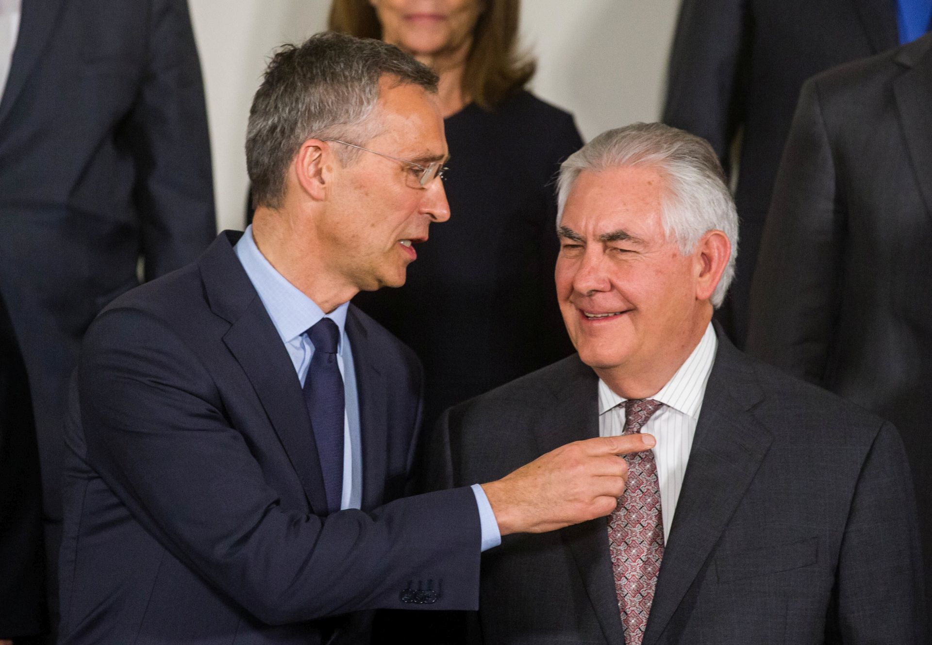 epa05880688 NATO Secretary General Jens Stoltenberg (L) and US Secretary of State Rex Tillerson (R)  attend a family picture during NATO foreign ministers meetings at alliance headquarters, in Brussels, Belgium, 31 March 2017. NATO Foreign Ministers gathered for a one day meeting of the North Atlantic Council (NAC).  EPA/STEPHANIE LECOCQ