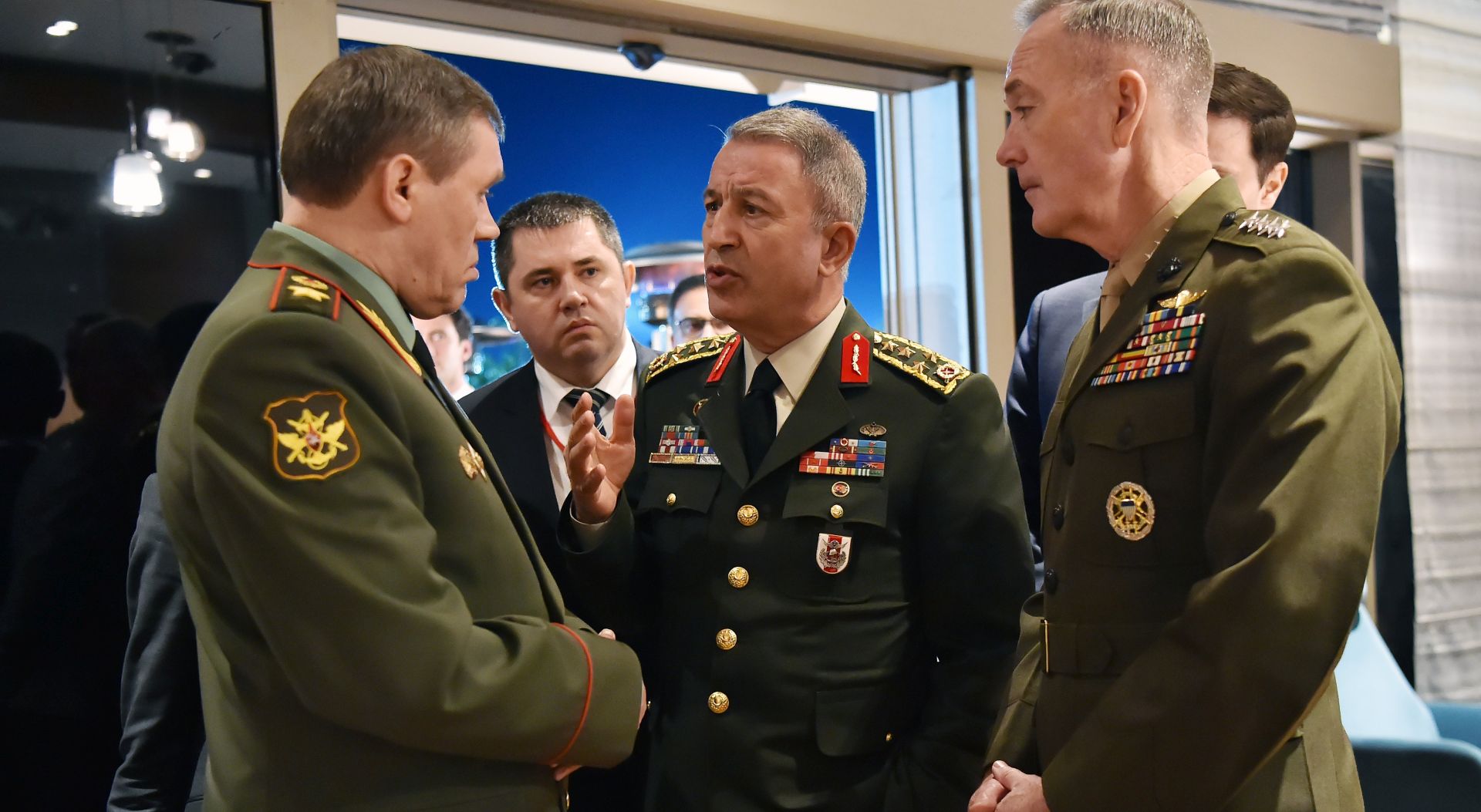 epa05835614 A handout photo made available by the Turkish Armed Forces General Staff Press Office shows Chief of the General Staff of the Turkish Armed Forces, Hulusi Akar (C), US Chariman of the Joint Staff General Joseph Dunford (R) and Russian Chief of General Staff General Valery Gerasimov (L)  after their meeting in Antalya, Turkey, 08 March 2017. Turkish, Russian and US Chiefs of General Staff met to discuss the recent operations against IS (Islamic State) in Syria.  EPA/TURKISH ARMED FORCES HANDOUT  HANDOUT EDITORIAL USE ONLY/NO SALES