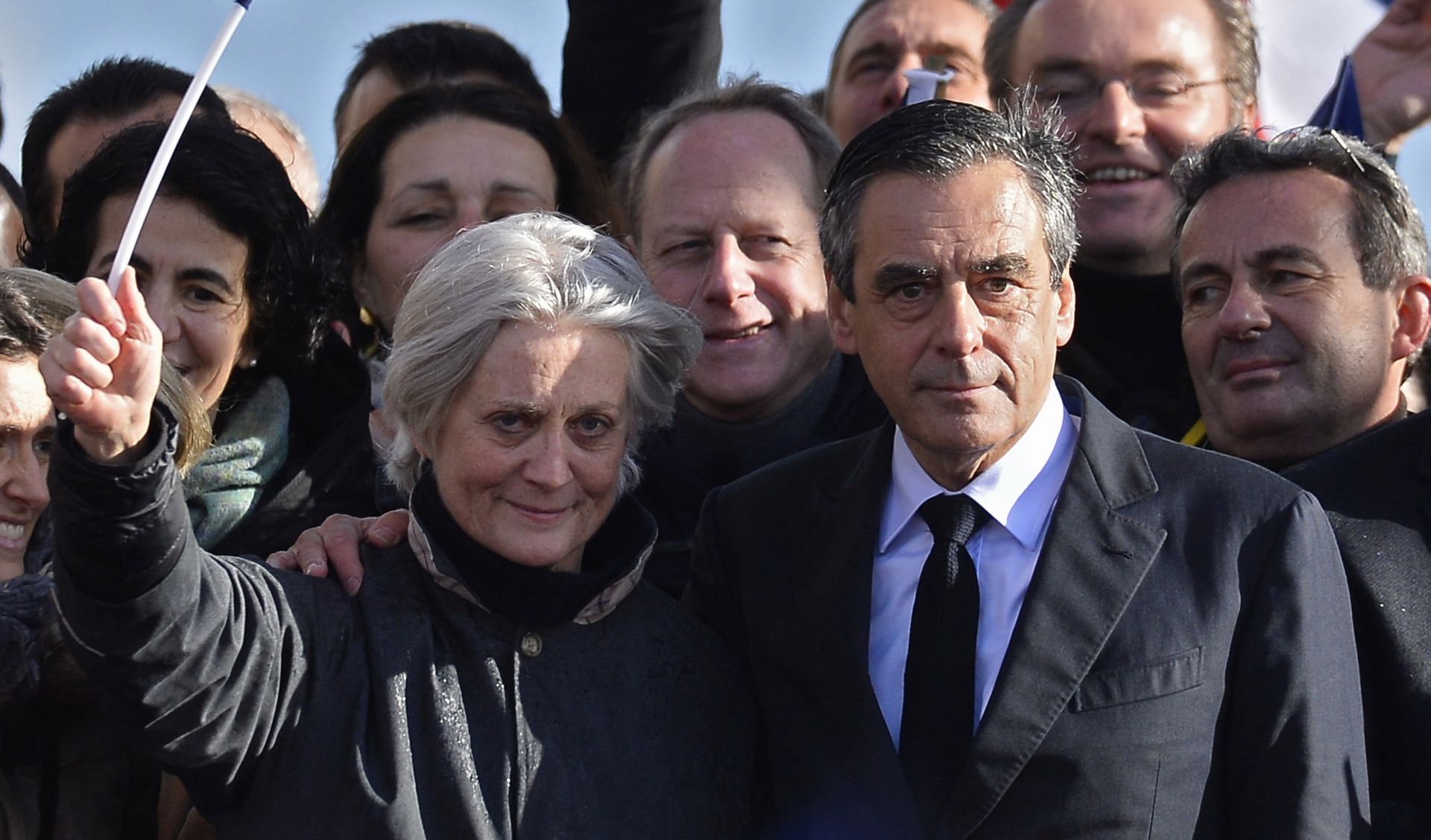 epa05876061 (FILE) A file picture dated 05 March 2017 'Les Republicains' party candidate for the 2017 French presidential elections, Francois Fillon (L) flanked by his wife Penelope (R) acknowledge cheers from the crowd after his speech during a meeting organized to support him on the Place du Trocadero in Paris, France. According to news reports late 28 March 2017, Penelope is now charged and under formal investigation over 'fake jobs' row, after appearing before investigating judges. Francois Fillon has been accused of improperly paying his wife and two of his children nearly a million euros in state funds for work they allegedly didn't do.  EPA/IAN LANGSDON