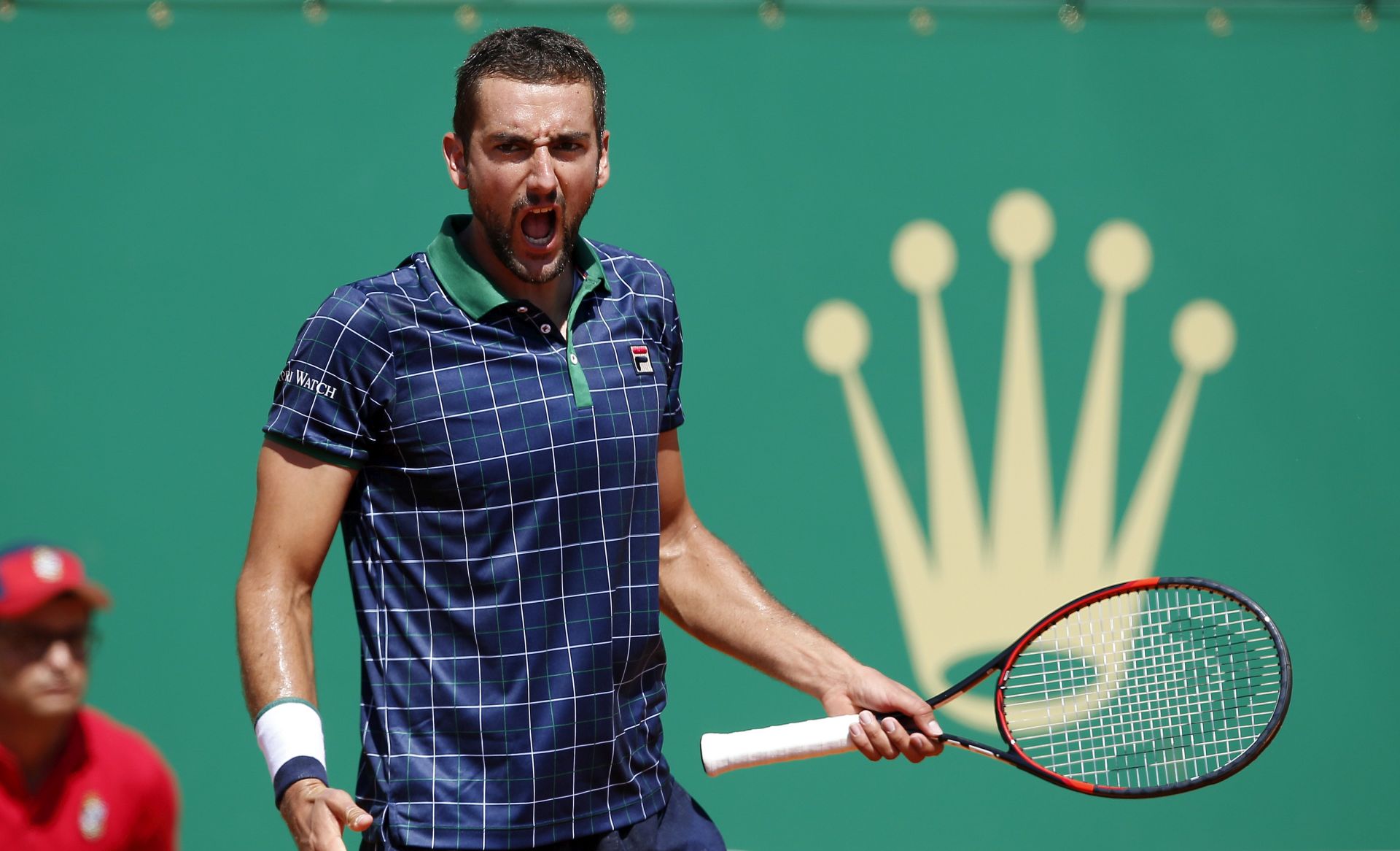 epa05918983 Marin Cilic of Croatia reacts uring his quarter final match against Albert Ramos-Vinolas of Spain at the Monte-Carlo Rolex Masters tournament in Roquebrune Cap Martin, France, 21 April 2017.  EPA/SEBASTIEN NOGIER