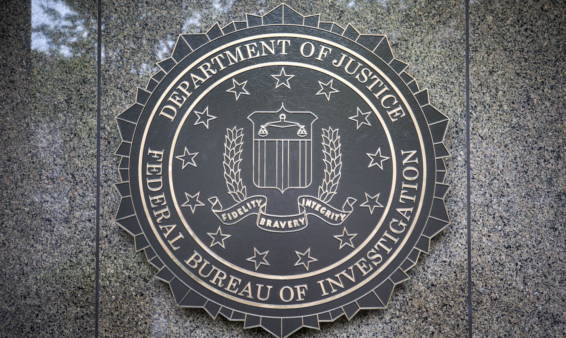 epa05957056 The seal of the Federal Bureau Of Investigation (FBI), the domestic intelligence and security service of the United States, at the facade of the J. Edgar Hoover FBI Building, in Washington, DC, USA, 11 May 2017. U.S. President Donald J. Trump on 09 May 2017 fired FBI director James Comey, regarded a controversial move given that Comey is investigating possible collusion between Russia and the Trump campaign.  EPA/JIM LO SCALZO