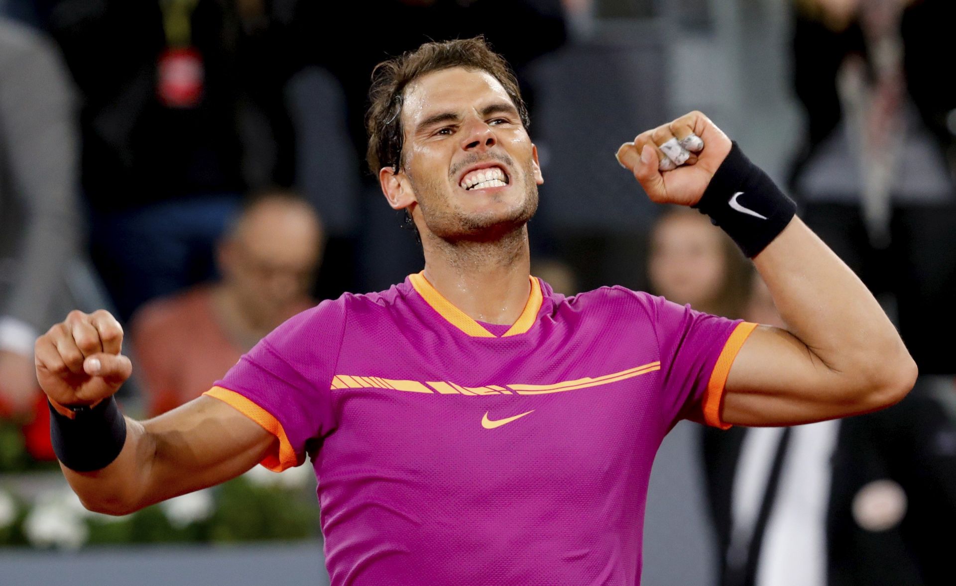 epa05959677 Spain's Rafael Nadal celebrates winning his quarter final match against Belgium's David Goffin at the Mutua Madrid Open tennis tournament, in Madrid, Spain, 12 May 2017.  EPA/JUANJO MARTIN