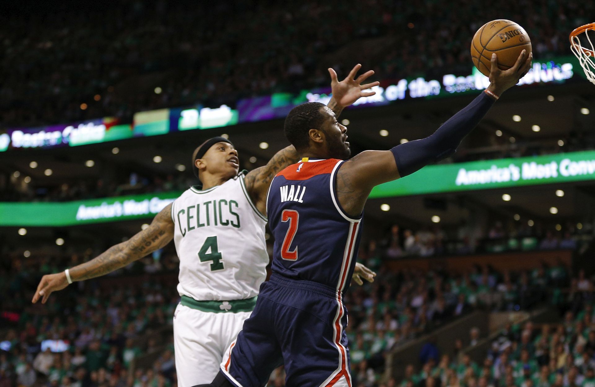 epa05956128 Washington Wizards guard John Wall (R) gets past defending Boston Celtics guard Isaiah Thomas (L) during the second half of their NBA Eastern Conference Semifinal game at the TD Garden in Boston, Massachusetts, USA, 10 May 2017. The Boston Celtics lead the best of seven series 3-2.  EPA/CJ GUNTHER