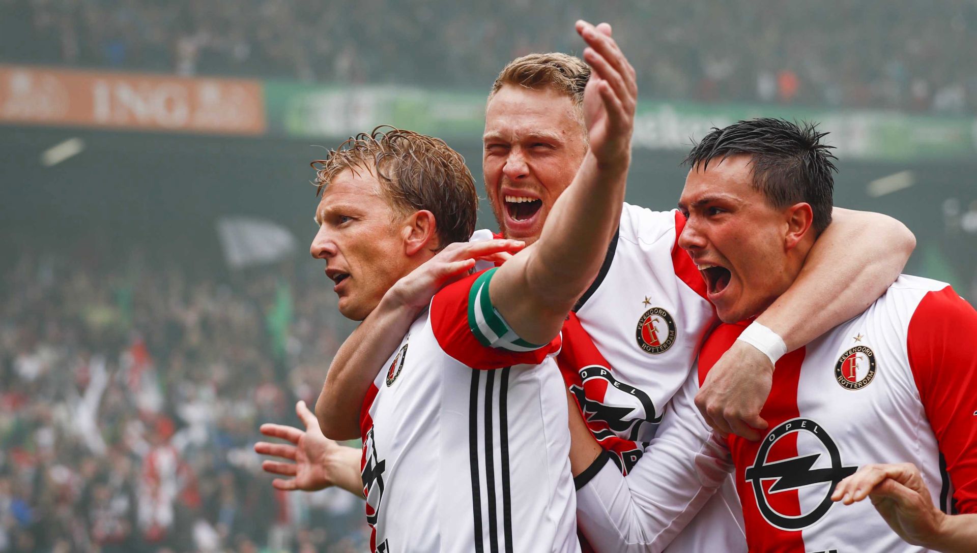 epa05963696 Feyenoord's Dirk Kuyt (L) celebrates with team mates after scoring a goal during the Dutch Eredivisie match between Feyenoord Rotterdam and Heracles Almelo at the Kuip stadium, Rotterdam, The Netherlands, 14 May 2017.  EPA/ROBIN VAN LONKHUIJSEN