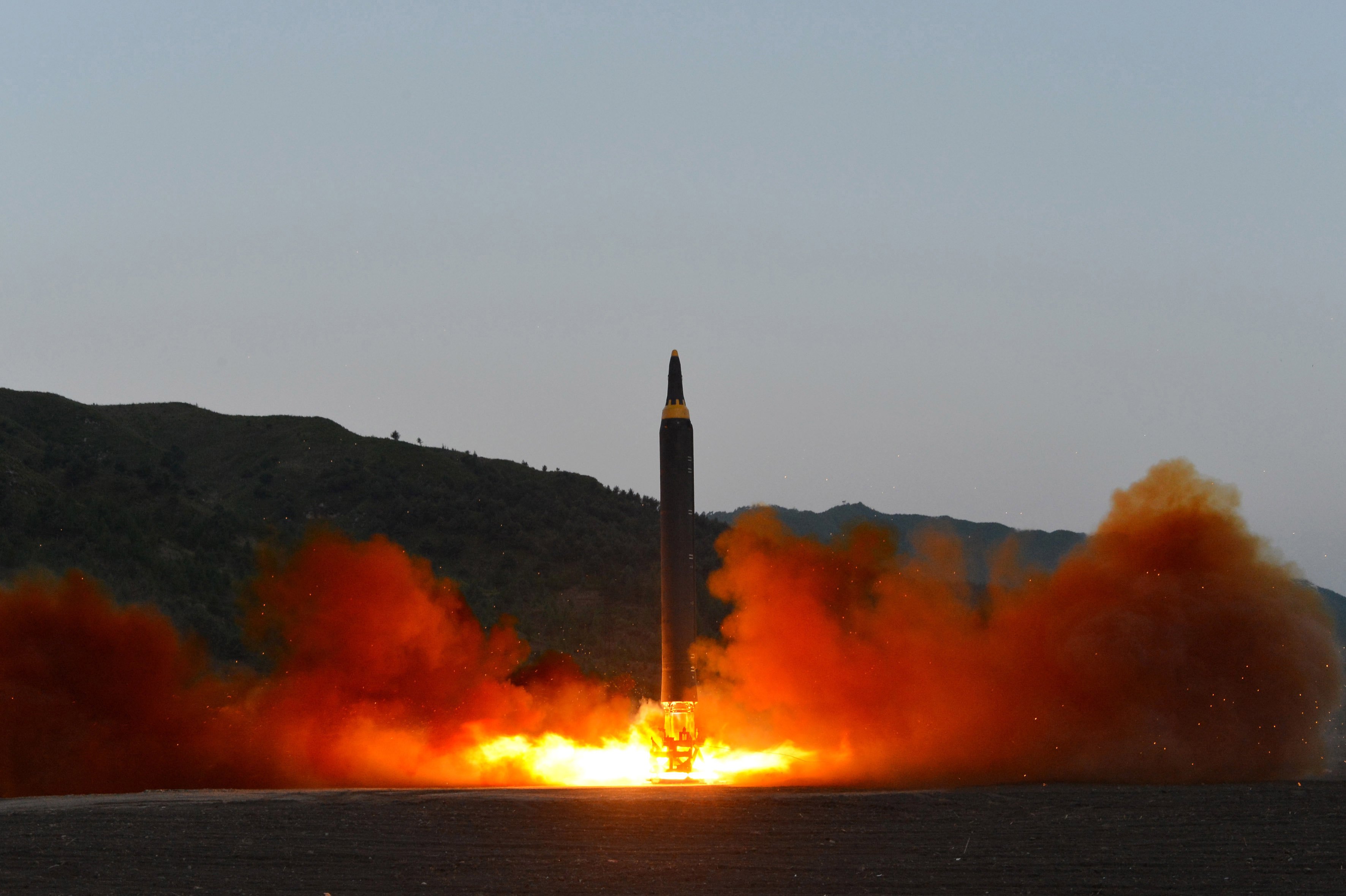 epa05965794 An undated photo released 15 May 2017 by North Korean Central News Agency (KCNA) showing the test-firing of a new ground-to-ground medium long-range strategic ballistic rocket Hwasong-12 on 14 May 2017. Reports state North Korean authorities claim the missile that reached an altitude of 2,000km, is capable of carrying a big nuclear warhead. The launch reportedly was overseen by North Korean leader Kim Jong Un.  EPA/KCNA   EDITORIAL USE ONLY/NO SALES