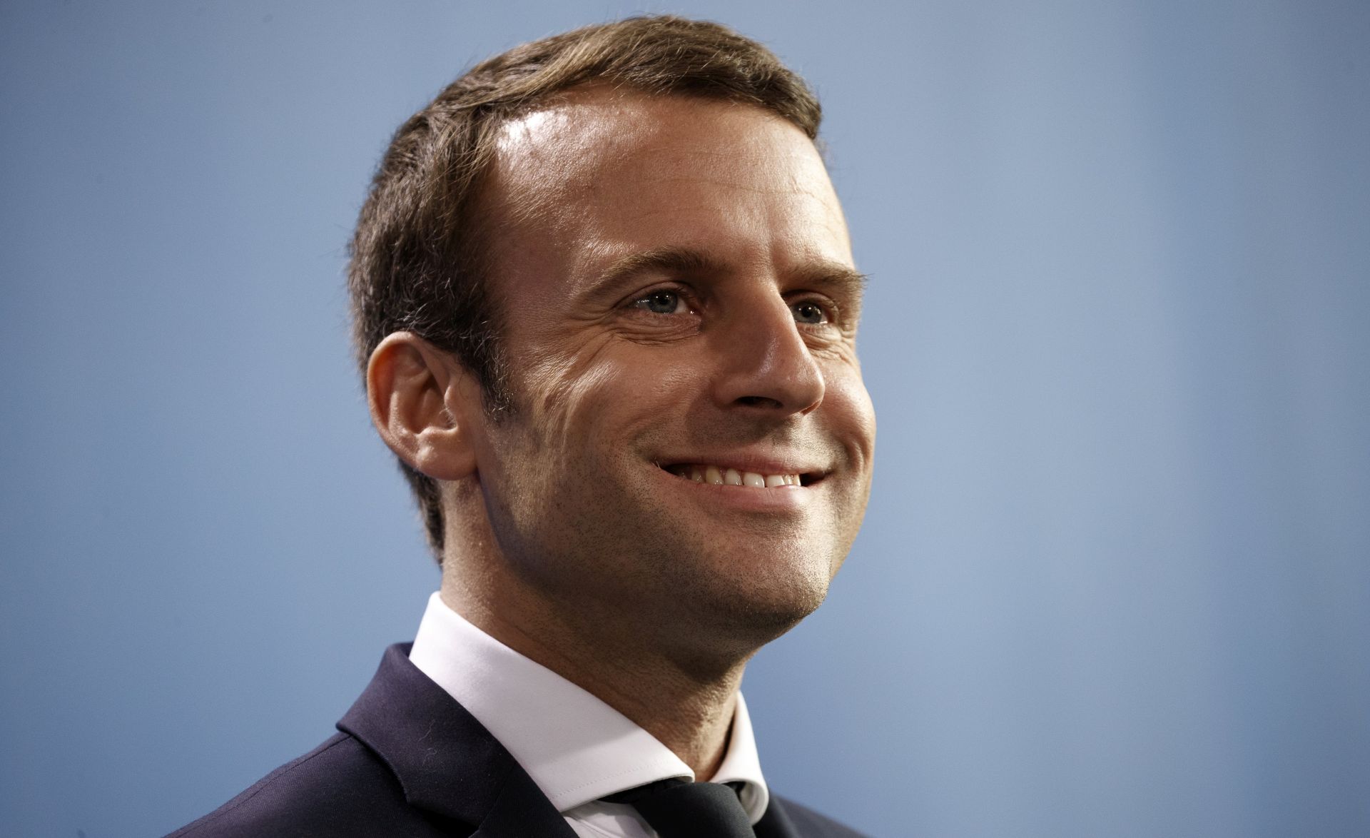 epa05966658 French President Emmanuel Macron speaks as German Chancellor Angela Merkel (not pictured) attend a joint press conference at the German Chancellery in Berlin, Germany, 15 May 2017. The French President makes his inaugural foreign visit to Germany.  EPA/CARSTEN KOALL