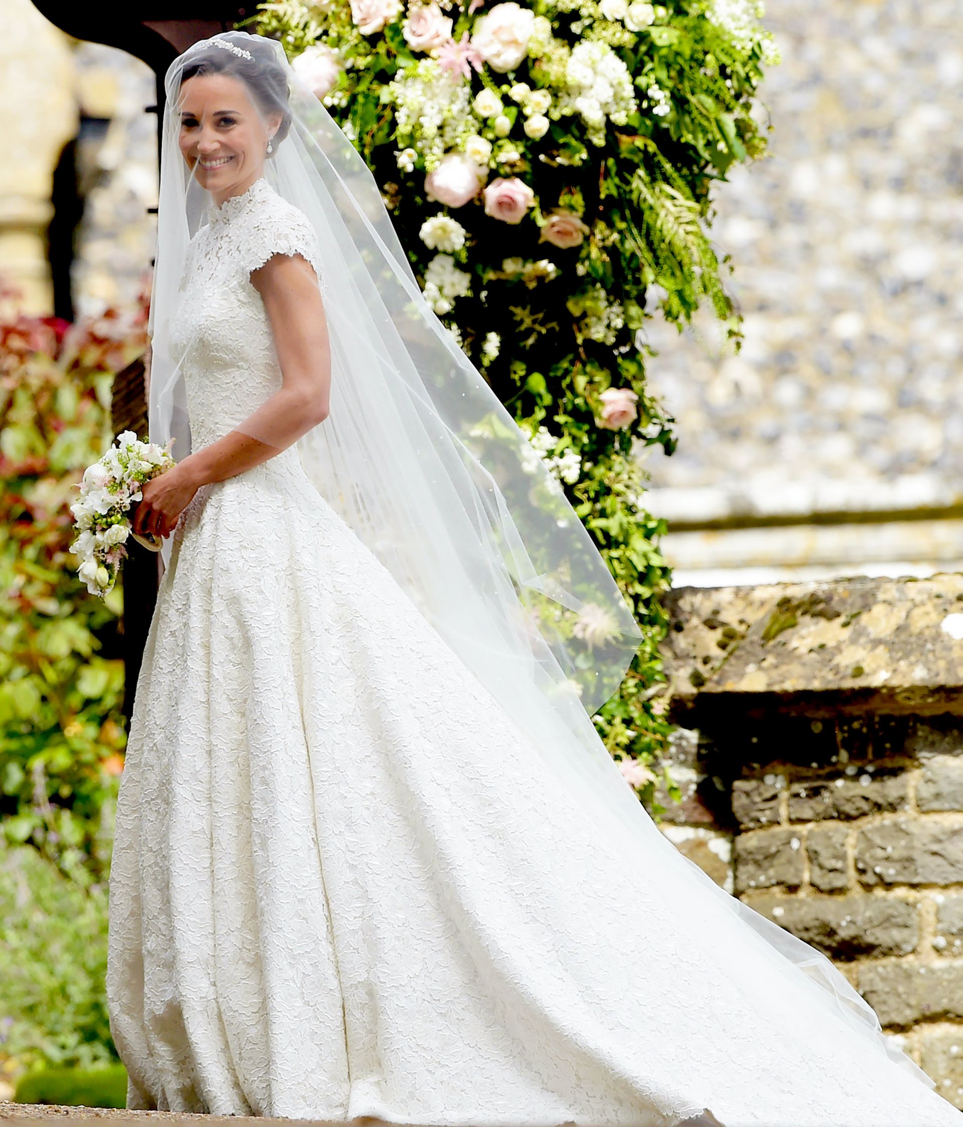 epa05976188 Pippa Middleton arrives for her wedding ceremony at St Mark's church in Englefield, Berkshire, Britain, 20 May 2017. Pippa Middleton, the younger sister of  Catherine, the Duchess of Cambridge is to marry financier James Matthews.  EPA/STRINGER / POOL UK OUT