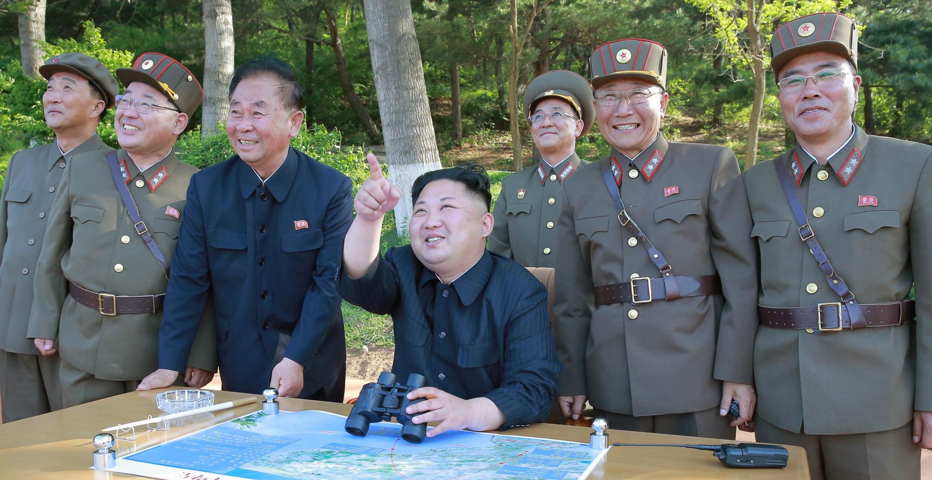 epa05981200 An undated image made available by the North Korean official news agency KCNA on 22 May 2017 shows supreme leader of the Democratic People's Republic of Korea Kim Jong-un (C) supervising the test-fire of the ground-to-ground medium-to-long range strategic ballistic missile Pukguksong-2 at an undisclosed location in North Korea. According to South Korea's Military, North Korea launched a ballistic missile on 21 May that flew more than 500km towards the Sea of Japan, the same type of missile reportedly test-launched on 12 February. The model, a Pukguksong-2, also known as a KN-15 missile, is an upgraded version of a submarine-launched ballistic missile (SLBM) using a solid fuel engine. North Korean state media confirmed the launch as 'successful' adding that the weapon was ready to be deployed for military action, media reported.  EPA/KCNA   EDITORIAL USE ONLY