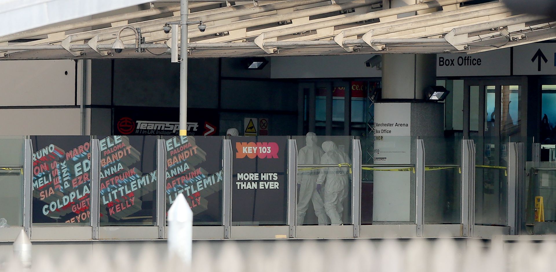epa05982780 Forensic officers enter the Manchester Arena in Manchester, Britain, 23 May 2017. According to a statement by the Greater Manchester Police, at least 22 people have been confirmed dead and around 59 others were injured, in an explosion at the Manchester Arena on the night of 22 May at the end of a concert by US singer Ariana Grande. Police believe that the explosion, which is being treated as a terrorist incident, was carried out by a single man using an improvised explosive device (IED), who was confirmed dead at the scene.  EPA/NIGEL RODDIS