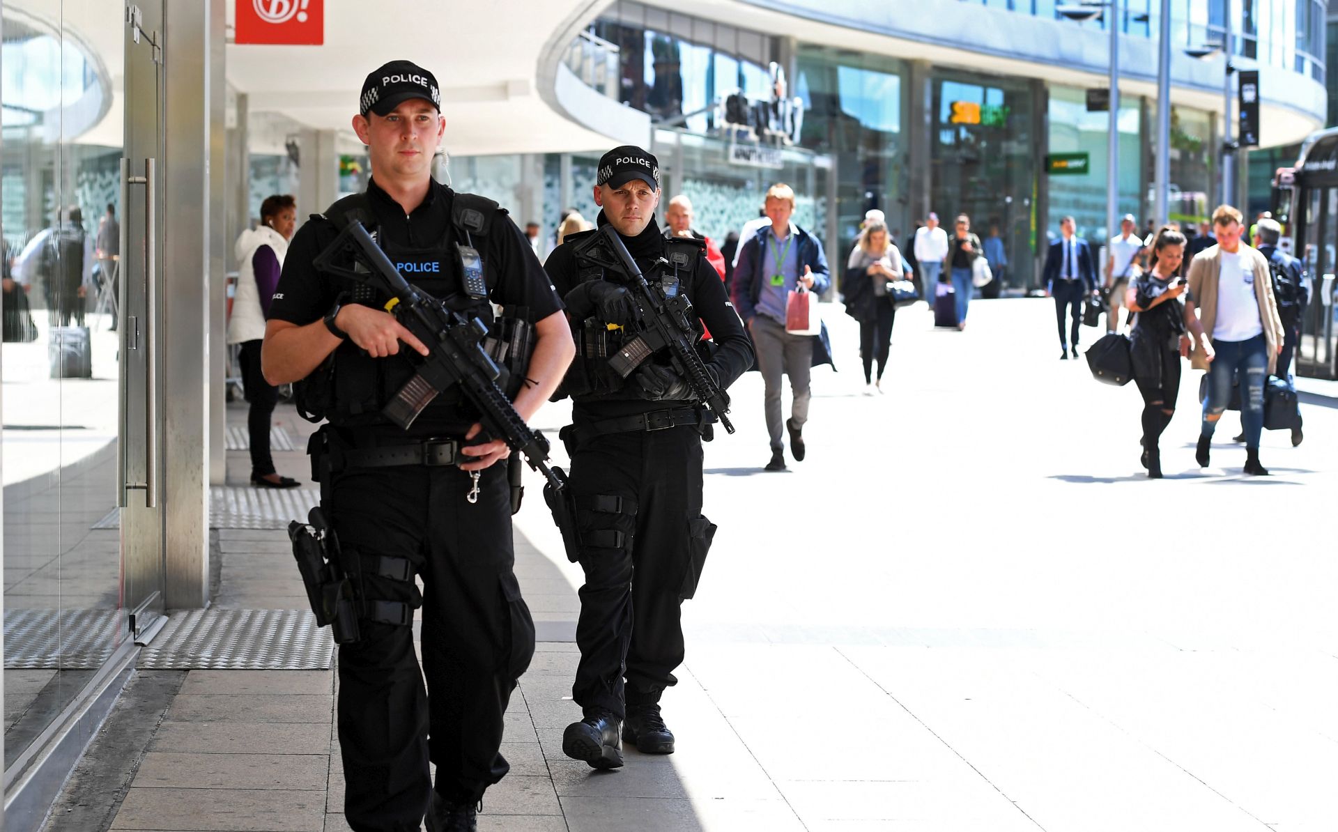 epa05983605 Armed police on patrol in central Manchester, Britain, 23 May 2017. According to a statement by the Greater Manchester Police, at least 22 people have been confirmed dead and around 59 others were injured, in an explosion at the Manchester Arena on the night of 22 May at the end of a concert by US singer Ariana Grande. Police believe that the explosion, which is being treated as a terrorist incident, was carried out by a single man using an improvised explosive device (IED), who was confirmed dead at the scene. British Prime Minister Theresa May in the meantime had condemned the incident as 'an appalling terrorist attack.'  EPA/ANDY RAIN
