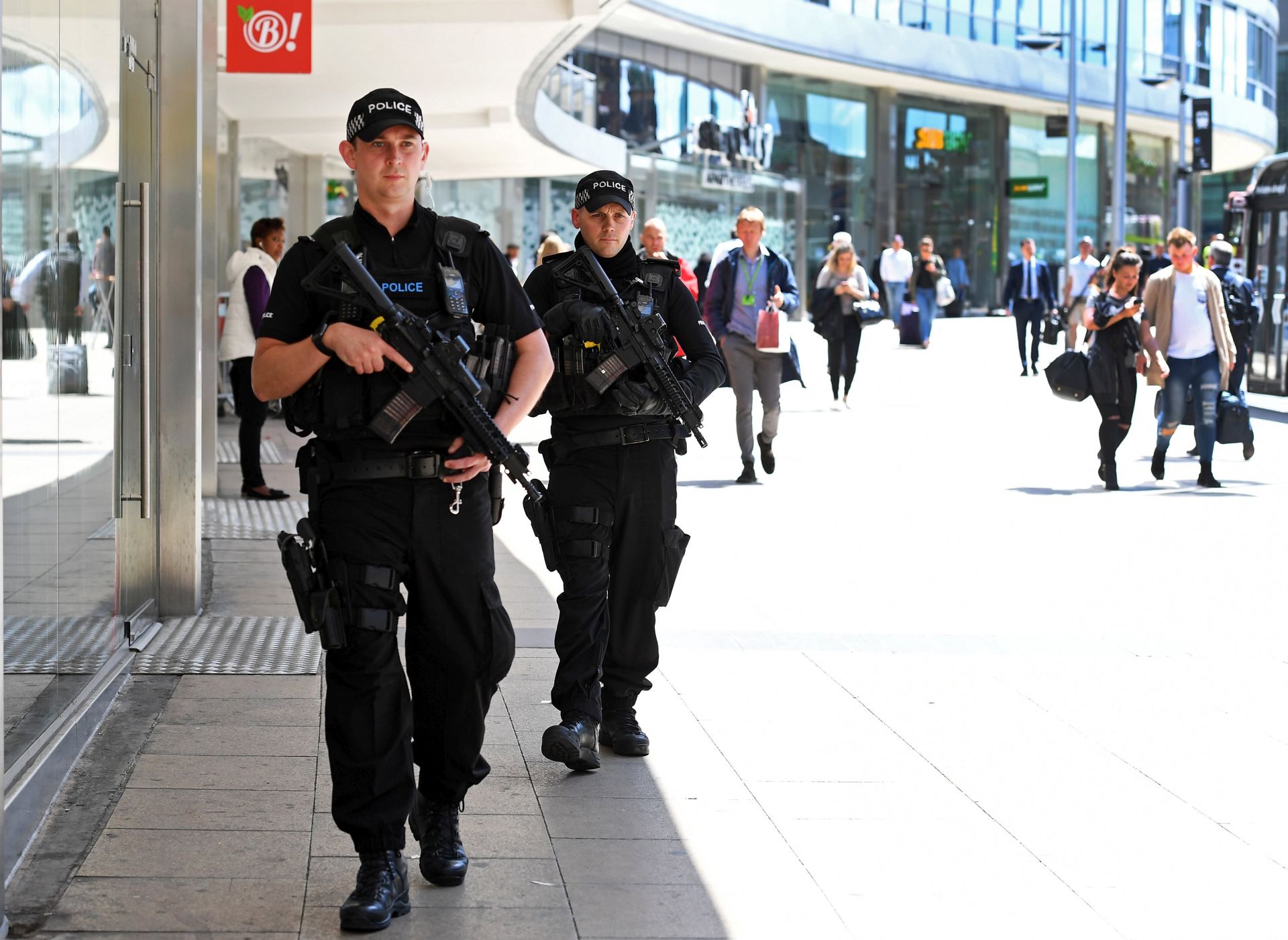 epa05983605 Armed police on patrol in central Manchester, Britain, 23 May 2017. According to a statement by the Greater Manchester Police, at least 22 people have been confirmed dead and around 59 others were injured, in an explosion at the Manchester Arena on the night of 22 May at the end of a concert by US singer Ariana Grande. Police believe that the explosion, which is being treated as a terrorist incident, was carried out by a single man using an improvised explosive device (IED), who was confirmed dead at the scene. British Prime Minister Theresa May in the meantime had condemned the incident as 'an appalling terrorist attack.'  EPA/ANDY RAIN