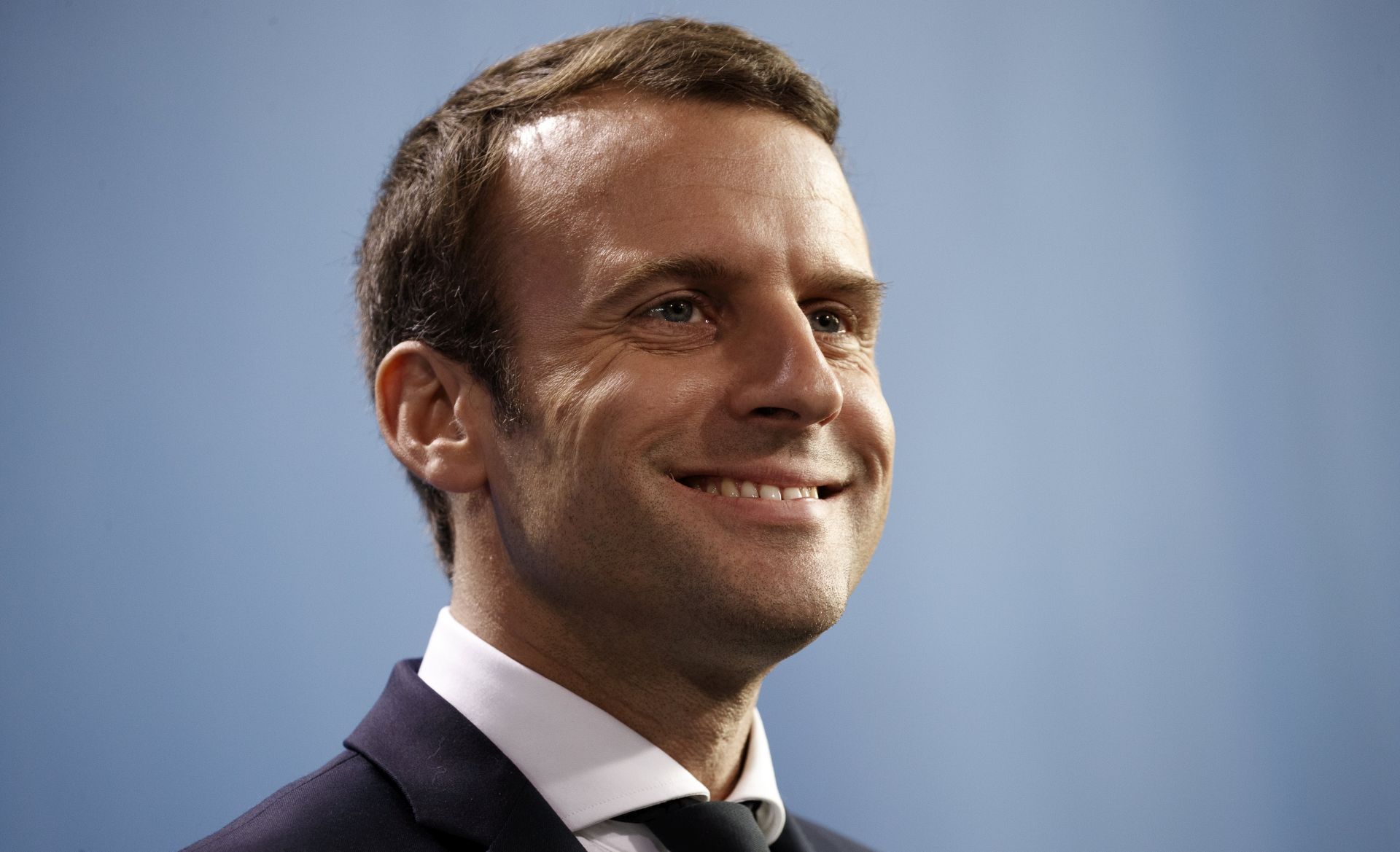 epa05966658 French President Emmanuel Macron speaks as German Chancellor Angela Merkel (not pictured) attend a joint press conference at the German Chancellery in Berlin, Germany, 15 May 2017. The French President makes his inaugural foreign visit to Germany.  EPA/CARSTEN KOALL