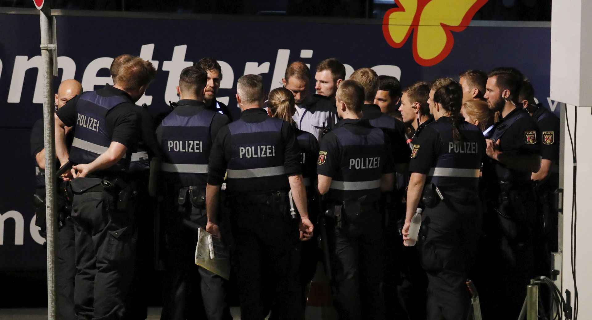 epa06007087 Police stands in a street near the 'Rock am Ring' festival after an evacuation after a terrorist threat warning at the Nuerburgring circuit in Nuerburg, Germany, 02 June 2017. The festival has been suspended. Over 80,000 people attended to the festival, which was due to run to 04 June. Security of the festival was increased in the wake of the Manchester concert bombing on 22 May.  EPA/RONALD WITTEK