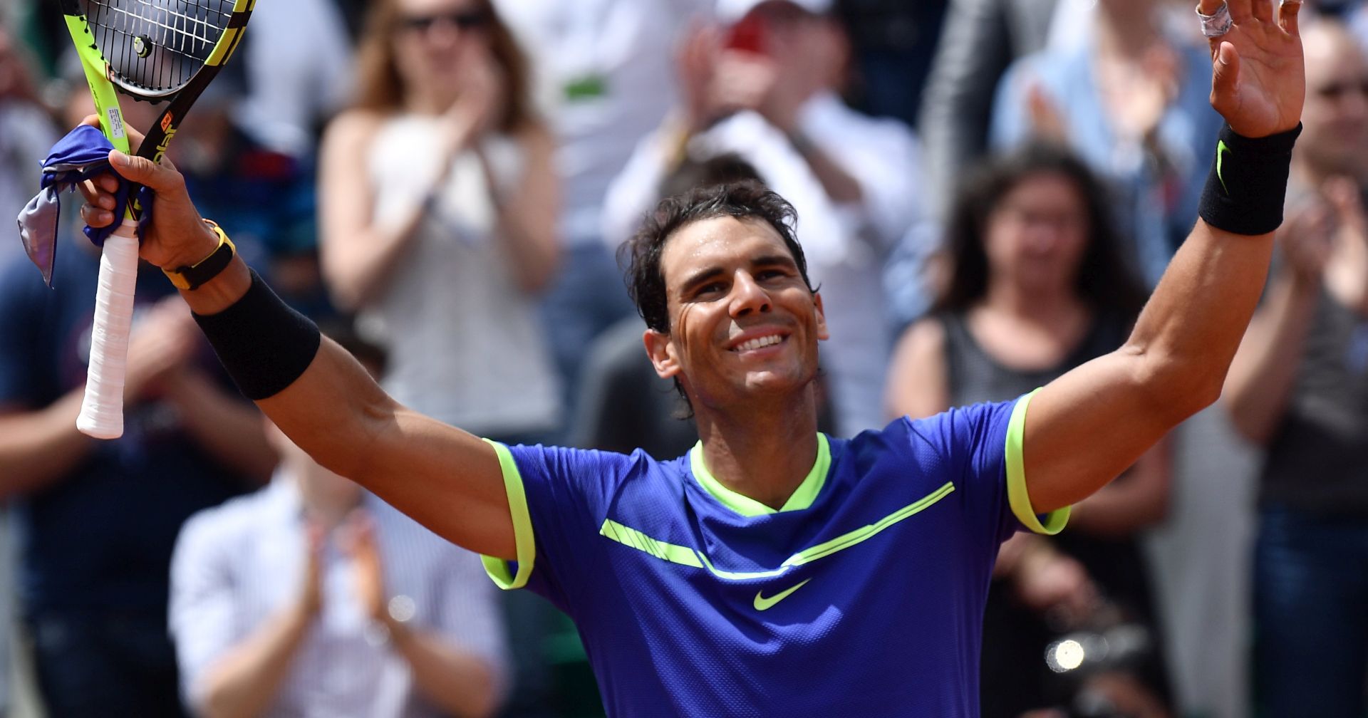 epa06009844 Rafael Nadal of Spain reacts after winning against Roberto Bautista Agut of Spain during their men’s singles 4th round match during the French Open tennis tournament at Roland Garros in Paris, France, 04 June 2017.  EPA/CHRISTOPHE PETIT TESSON