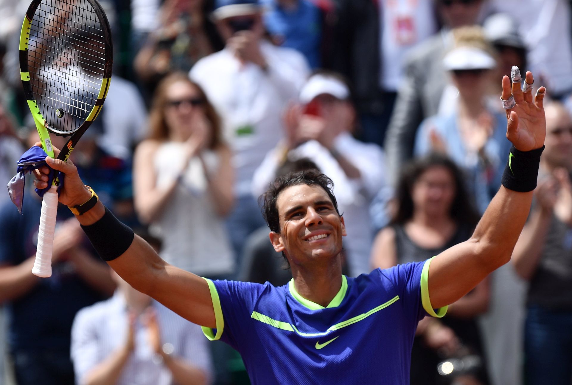 epa06009844 Rafael Nadal of Spain reacts after winning against Roberto Bautista Agut of Spain during their men’s singles 4th round match during the French Open tennis tournament at Roland Garros in Paris, France, 04 June 2017.  EPA/CHRISTOPHE PETIT TESSON
