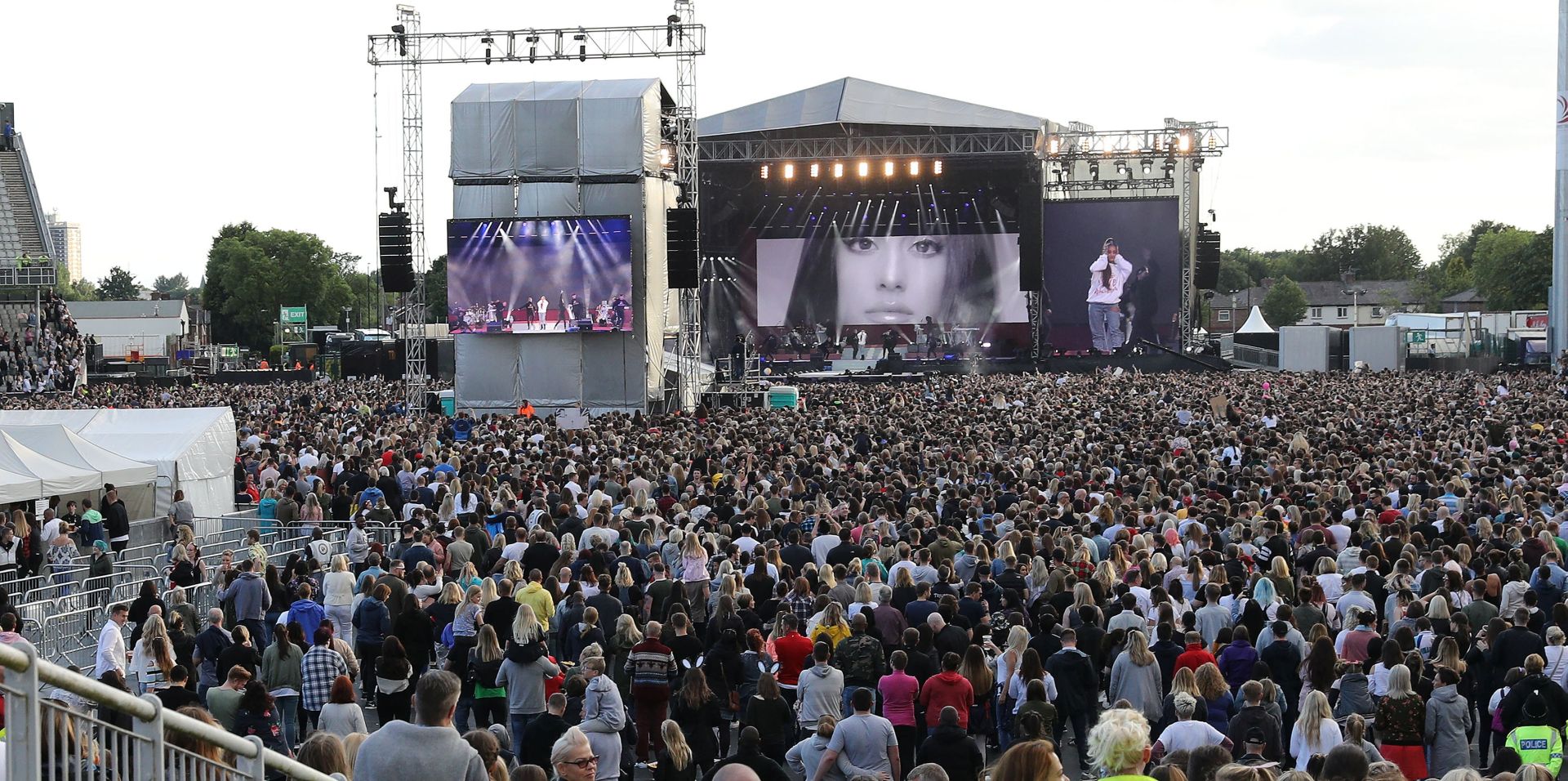 epa06010700 Ariana Grande on stage during her One Love Manchester concert at Old Trafford Cricket Ground in Manchester, Britain, 4 June 2017. Grande returns to Manchester for an all-star concert as tribute to the victims of a suicide bombing attack during her previous concert at the Manchester Arena on late 22 May, that resulted in the deaths of at least 22 people and the serious injuries of dozens of others.  EPA/NIGEL RODDIS