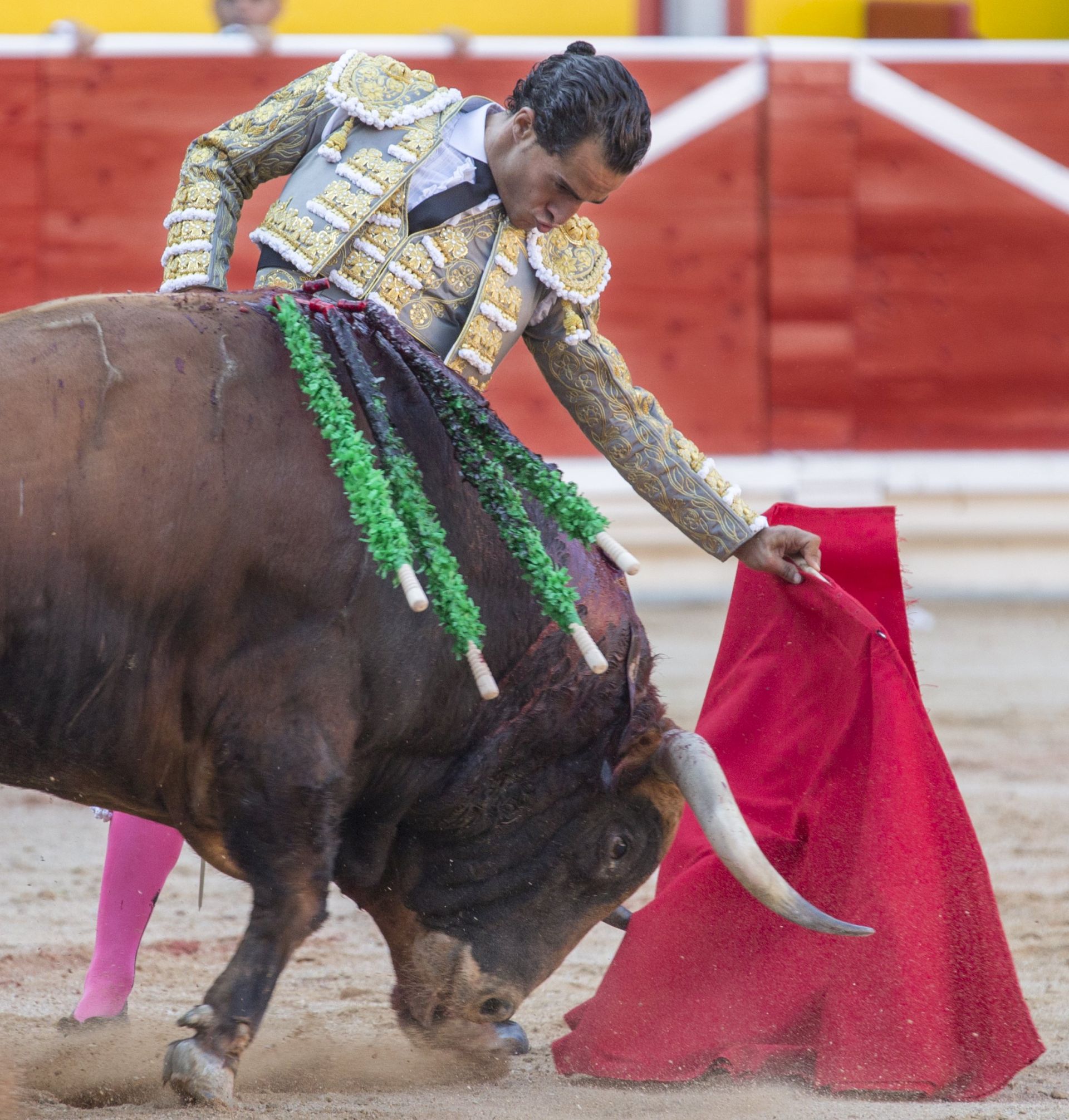 epa06034486 (FILE) - A photograph released 17 June 2017 shows Spanish bullfighter Ivan Fandino  as he fights a bull in a bullfight in the Fiesta de San Fermín in Pamplona, northern Spain, 10 July 2015. Fandino, 36, was gored by a bull during a bullfight in Aire-sur-l'Adour, in south east France on 17 June 2017 and was pronounced dead on arrival in hospital in Mont de Marsan where doctors were not able to save him.  EPA/JIM HOLLANDER
