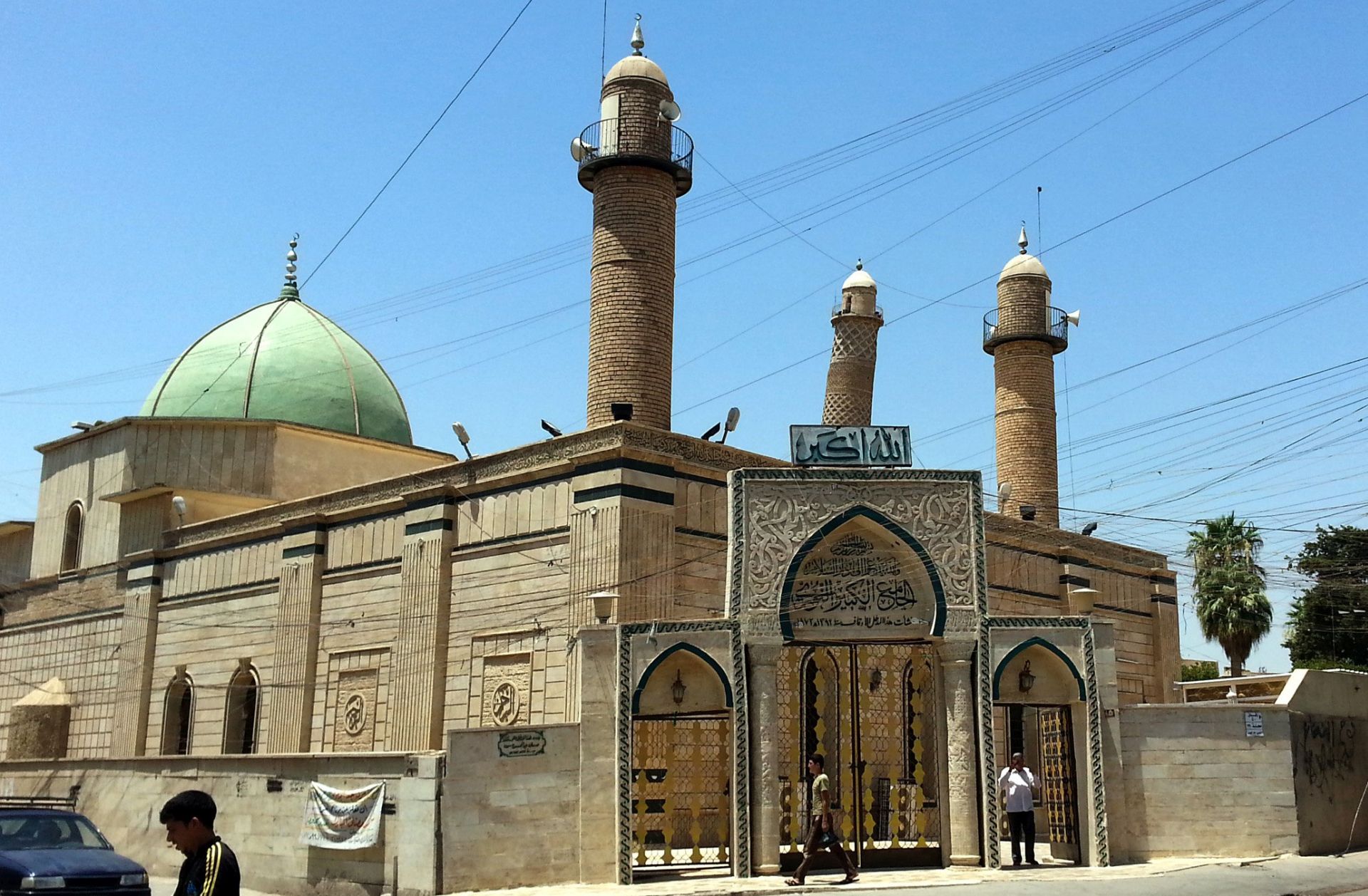 epa06041871 (FILE) - People walk in front of the Al-Noori Al-Kabeer mosque in Mosul, Iraq, 09 July 2014 (reissued 21 June 2017). According to media reports on 21 June 2017 citing Iraq's military, the Great Mosque of al-Nuri and its leaning minaret have been destroyed by members of the Islamic State militant group. Abu Bakr al-Baghdadi, the leader of the Sunni extremist group IS appeared for the first time in public at the mosque to declared caliphate on 04 July 2014.  EPA/STR