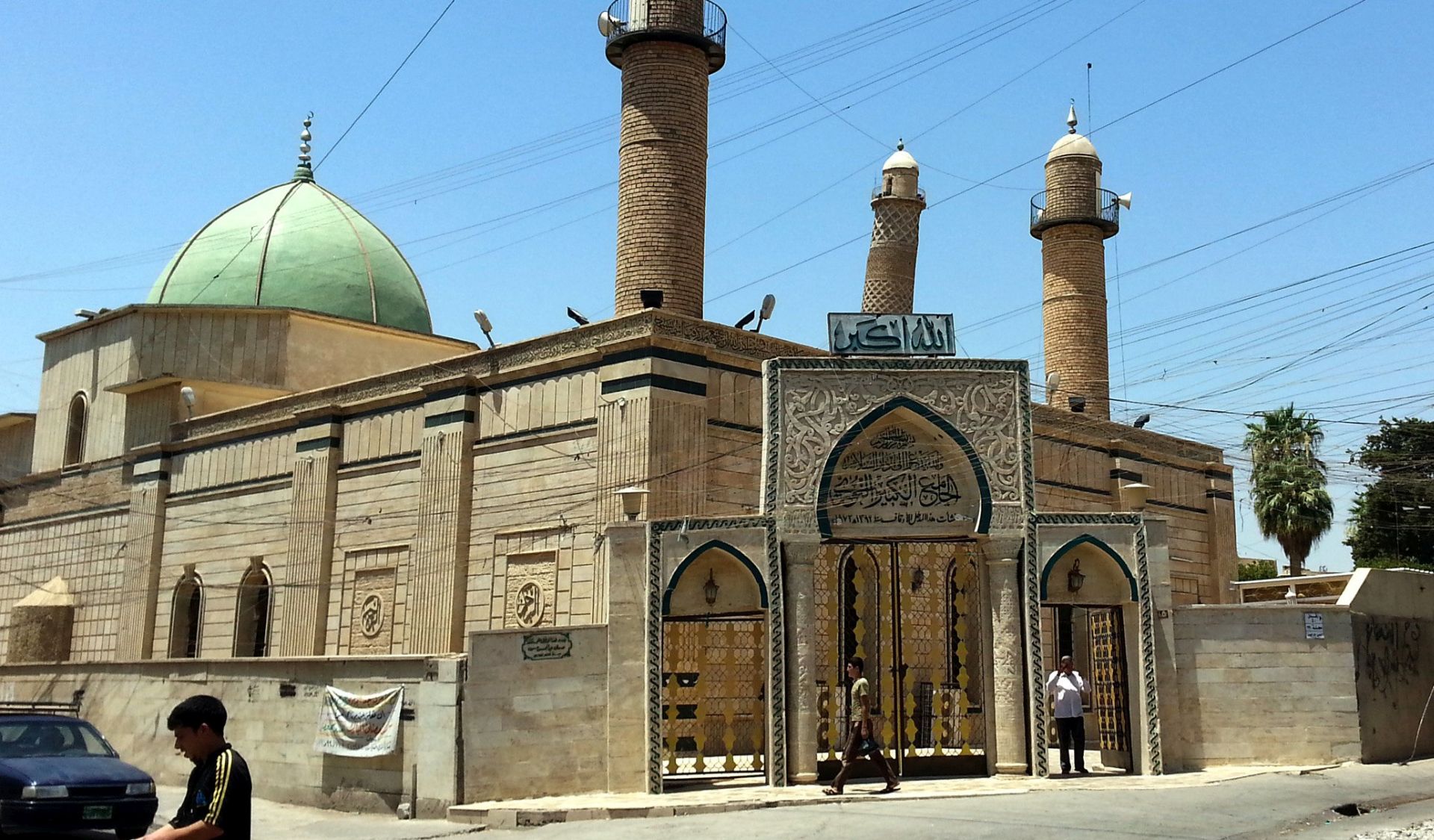 epa06041871 (FILE) - People walk in front of the Al-Noori Al-Kabeer mosque in Mosul, Iraq, 09 July 2014 (reissued 21 June 2017). According to media reports on 21 June 2017 citing Iraq's military, the Great Mosque of al-Nuri and its leaning minaret have been destroyed by members of the Islamic State militant group. Abu Bakr al-Baghdadi, the leader of the Sunni extremist group IS appeared for the first time in public at the mosque to declared caliphate on 04 July 2014.  EPA/STR