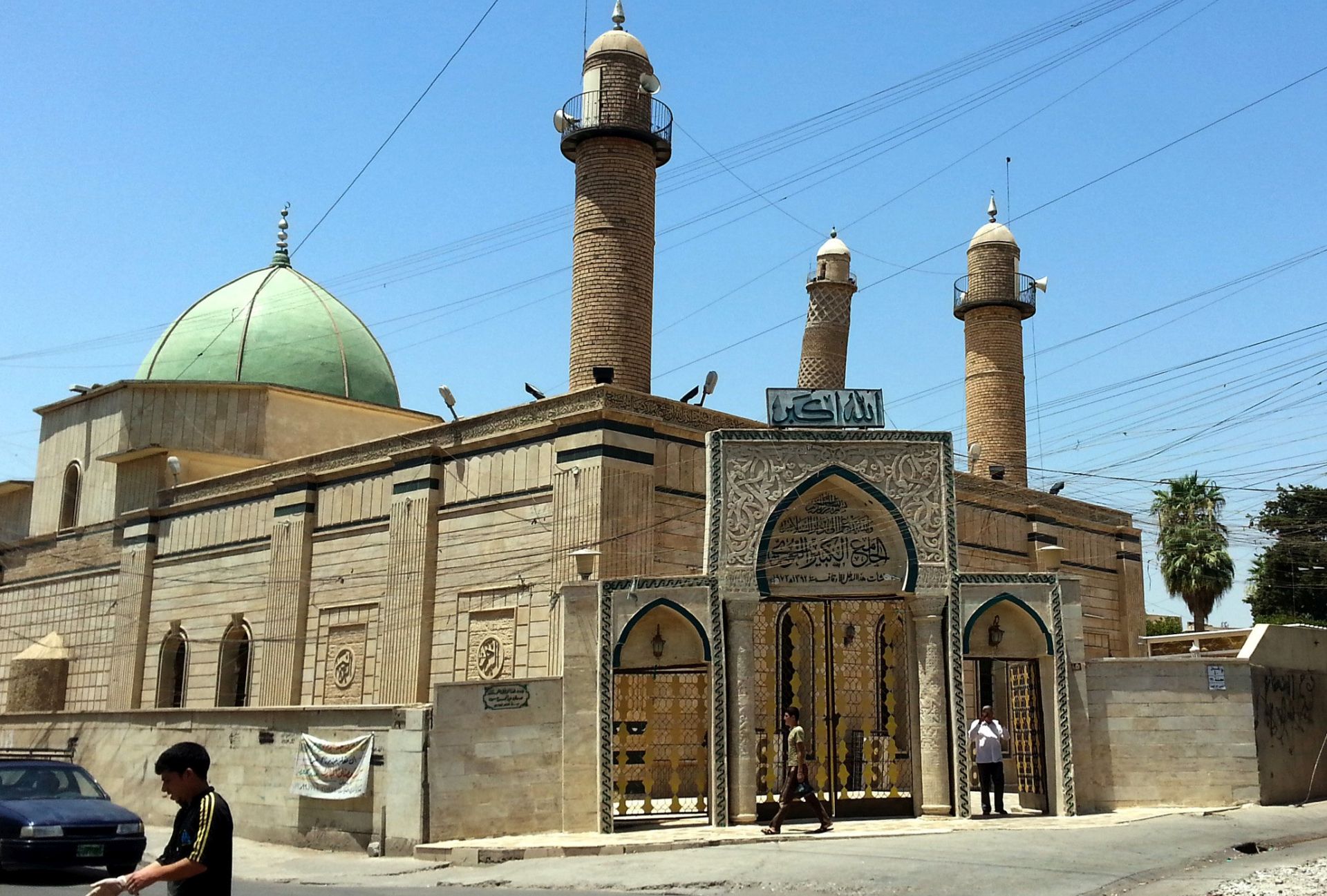 epa06041871 (FILE) - People walk in front of the Al-Noori Al-Kabeer mosque in Mosul, Iraq, 09 July 2014 (reissued 21 June 2017). According to media reports on 21 June 2017 citing Iraq's military, the Great Mosque of al-Nuri and its leaning minaret have been destroyed by members of the Islamic State militant group. Abu Bakr al-Baghdadi, the leader of the Sunni extremist group IS appeared for the first time in public at the mosque to declared caliphate on 04 July 2014.  EPA/STR