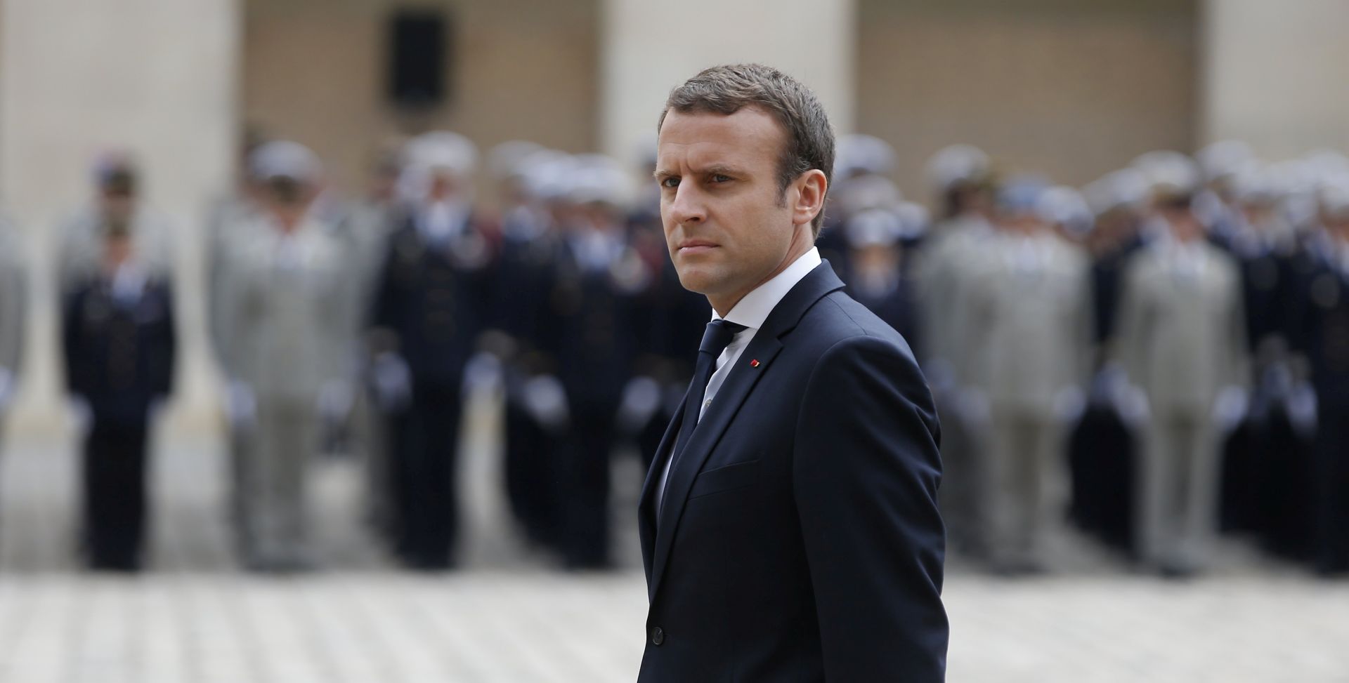 epa06058011 France's President Emmanuel Macron reviews troops during a medal presentation ceremony to French military personnel at the Hotel des Invalides, in Paris, France, 30 June 2017.  EPA/Thibault Camus / POOL MAXPPP OUT