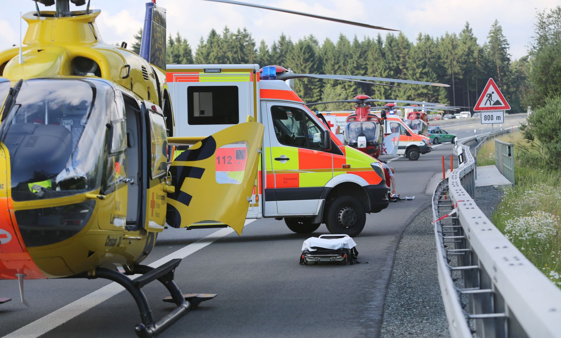 Fire fighters and emergency services can be seen at the motorway A9 near Muenchberg, Germany, 3 July 2017. According to the newest information available a travel bus collided with a truck and caught fire. Photo: News5 / Fricke/NEWS5/dpa