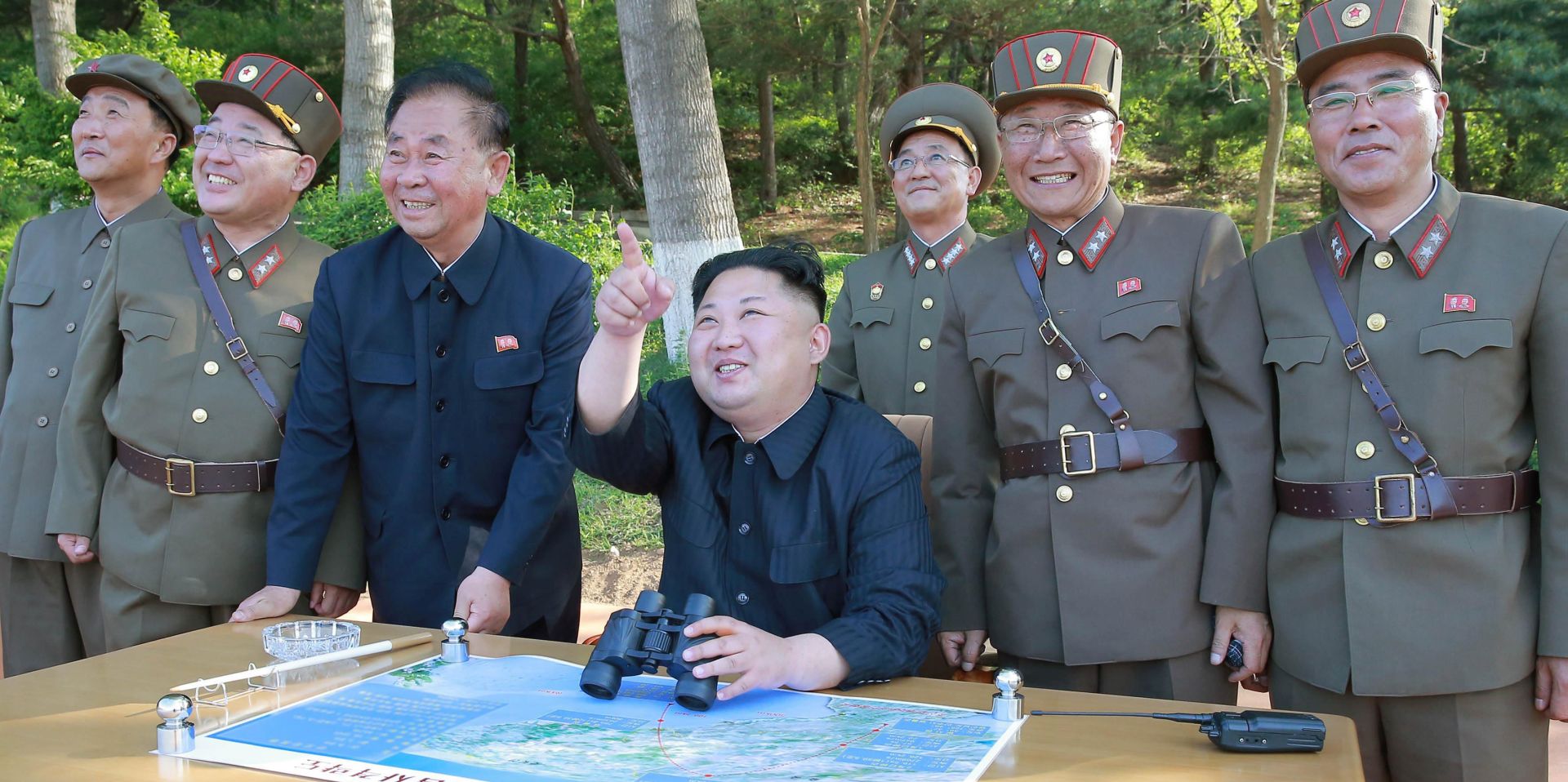 epa06064631 (FILE) - An undated file handout photo made available by the North Korean official news agency KCNA on 22 May 2017 shows supreme leader of the Democratic People's Republic of Korea Kim Jong-un (C) supervising the test-fire of the ground-to-ground medium-to-long range strategic ballistic missile Pukguksong-2 at an undisclosed location in North Korea (reissued 04 July 2017). According to media reports, North Korea launched a ballistic missile on 04 July, that flew around 930km towards the Sea of Japan. The missile fell into Japan's exclusive economic zone in the Sea of Japan, according to Japanese Chief Cabinet Secretary Yoshihide Suga. North Korea said that it has successfully tested an intercontinental ballistic missile (ICBM).  EPA/KCNA HANDOUT  HANDOUT EDITORIAL USE ONLY/NO SALES