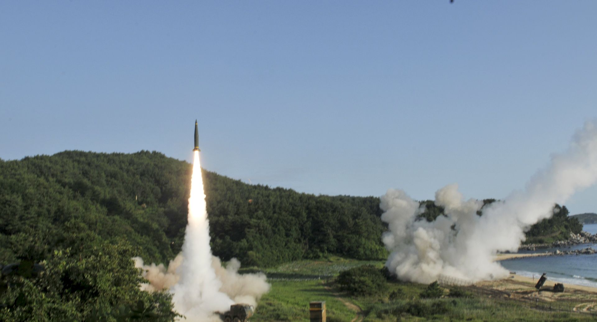 epa06066634 A handout photo made available by the United States Forces Korea (USFK) and the 8th Army shows missiles being fired during US-South Korean joint Precision Firing Capability exercise along the east coast in South Korea, 05 July 2017. Eighth US Army and South Korean military personnel performed joint exercises using the Army Tactical Missile System (ATACMS) and the Republic of Korea Hyunmoo Missile II in response to North Korea's ballistic missile test on 04 July, that US officials have confirmed to be an intercontinental ballistic missile.  EPA/USFK AND 8TH US ARMY HANDOUT  HANDOUT EDITORIAL USE ONLY/NO SALES