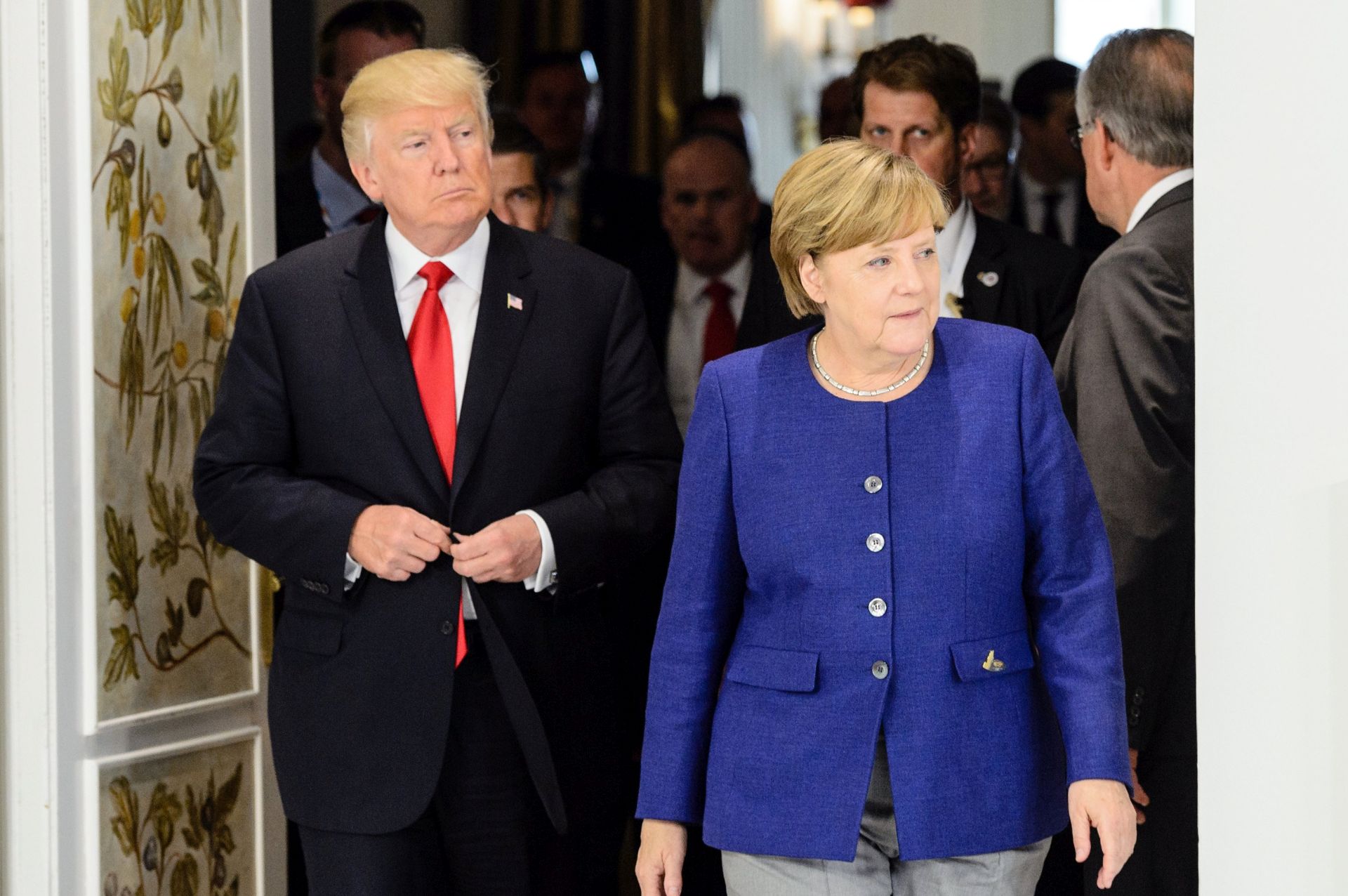 epa06070741 German Chancellor Angela Merkel (R) and US President Donald J. Trump (L) attend their meeting in the Hotel Atlantic one day prior to the G20 summit for bilateral talks in Hamburg, Germany, 06 Julty 2017. The G20 Summit (or G-20 or Group of Twenty) is an international forum for governments from 20 major economies. The summit is taking place in Hamburg 07 to 08 July 2017.  EPA/JENS SCHLUETER / POOL