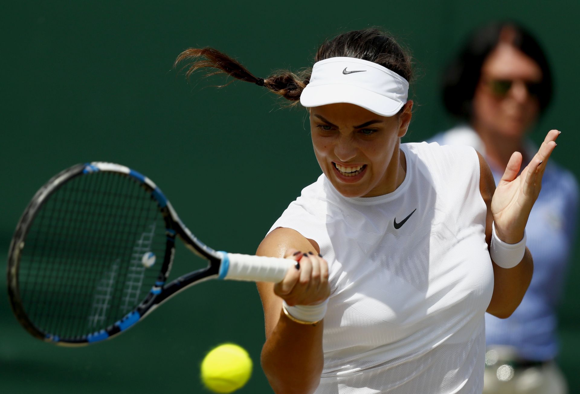 epa06073080 Ana Konjuh of Croatia in action against Dominika Cibulkova of Slovakia during their third round match for the Wimbledon Championships at the All England Lawn Tennis Club, in London, Britain, 07 July 2017.  EPA/NIC BOTHMA EDITORIAL USE ONLY/NO COMMERCIAL SALES