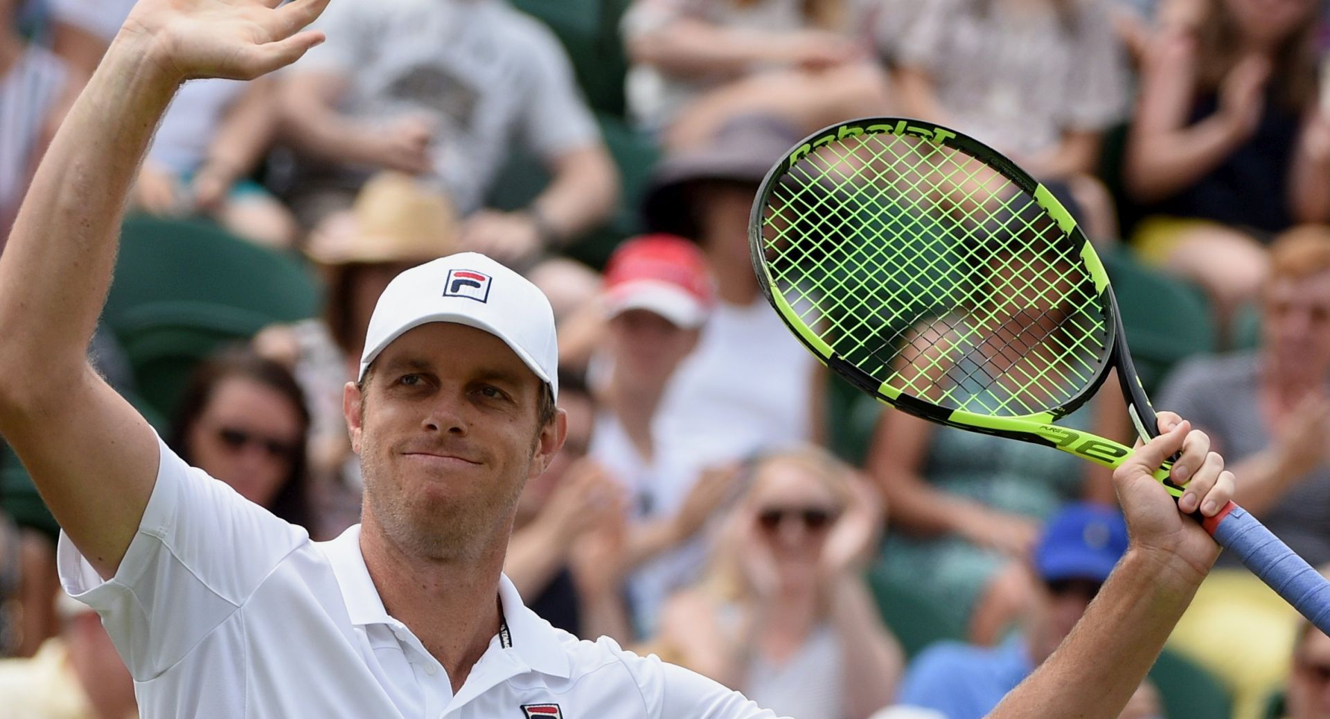 epa06075761 Sam Querrey of the USA celebrates winning against Jo-Wilfried Tsonga of France during their third round match for the Wimbledon Championships at the All England Lawn Tennis Club, in London, Britain, 08 July 2017.  EPA/FACUNDO ARRIZABALAGA EDITORIAL USE ONLY/NO COMMERCIAL SALES