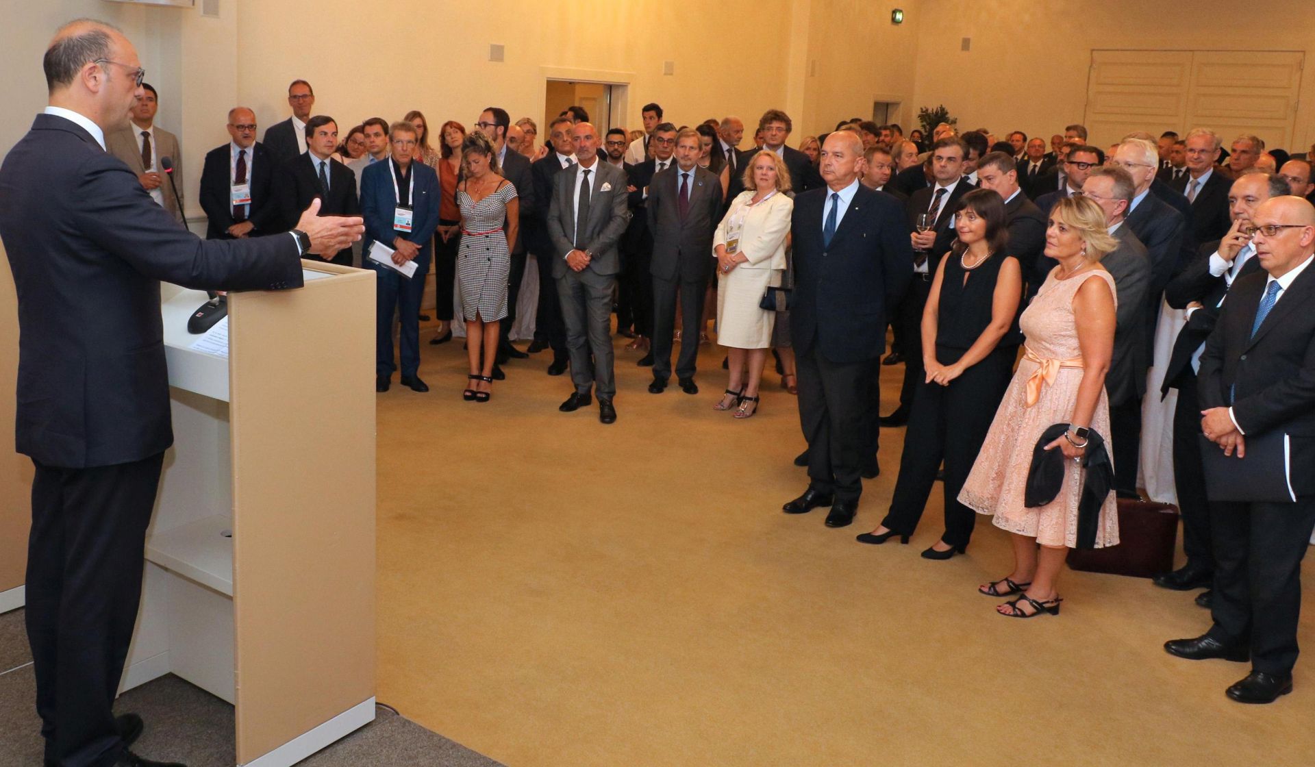 epa06081886 Italian Foreign Minister, Angelino Alfano (L), greets participants at a welcome cocktail party on the eve of the Western Balkans Meeting in Trieste, Italy, 11 July 2017. Heads of government, foreign ministers and economic ministers of the Balkans and EU members states are attending the meeting. Key issues at the meeting are expected to include laying foundations for a common Balkan market and increased regional cooperation.  EPA/ANDREA LASORTE