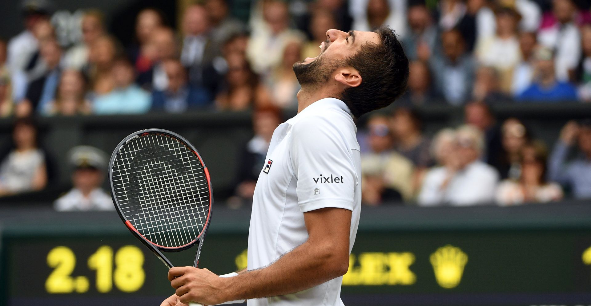 epa06087098 Marin Cilic of Croatia reacts as he plays Sam Querrey of the US in their semi final match during the Wimbledon Championships at the All England Lawn Tennis Club, in London, Britain, 14 July 2017.  EPA/FACUNDO ARRIZABALAGA EDITORIAL USE ONLY/NO COMMERCIAL SALES