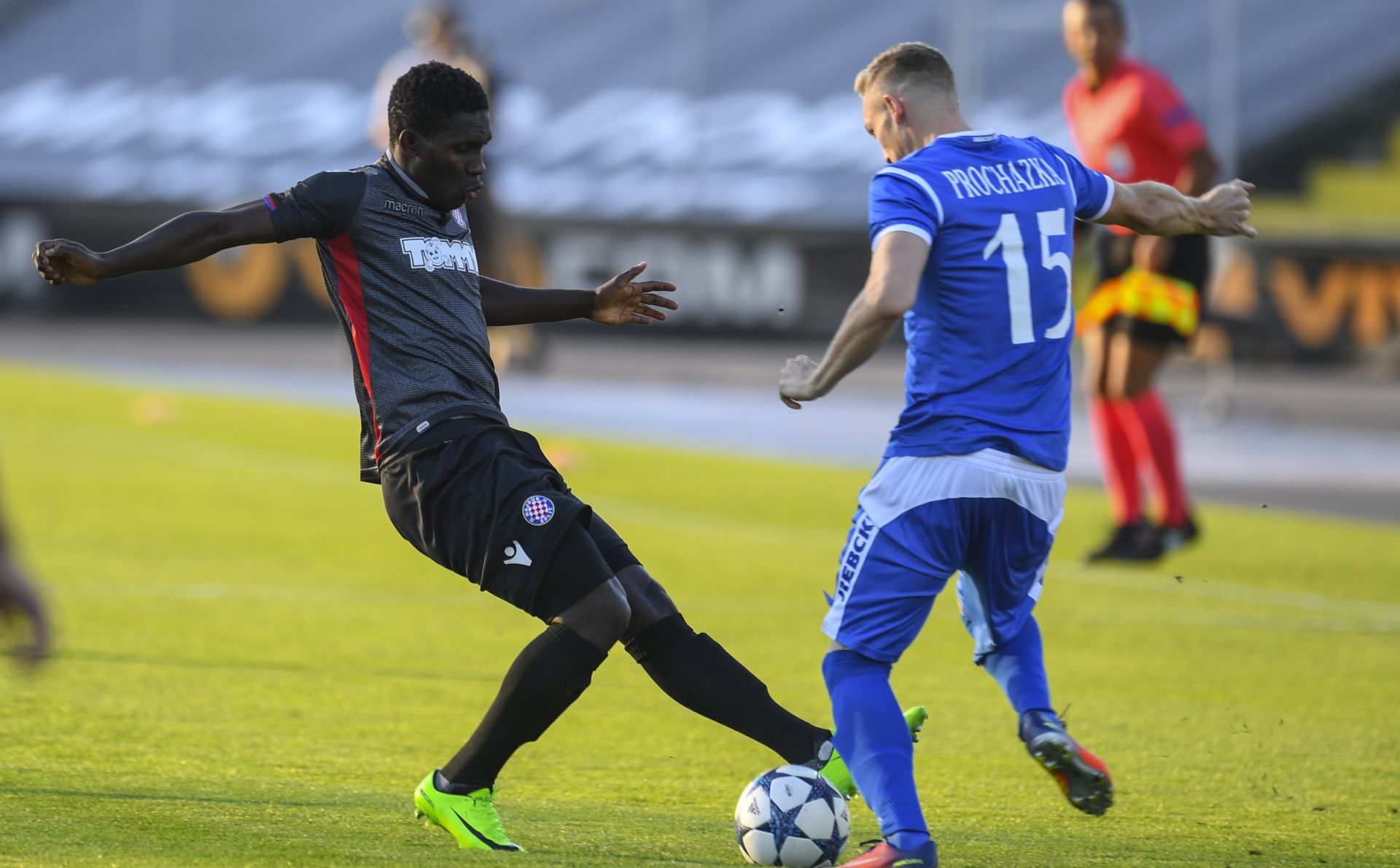 epa06099434 Roman Prochazka of PFC Levski (R) vies for the ball with Barry Hamza of Hajduk Split (L) during their UEFA Europa League, second qualifying round 2nd leg soccer match between PFC Levski and Hajduk Split in Sofia , Bulgaria, 20 August 2017.  EPA/VASSIL DONEV