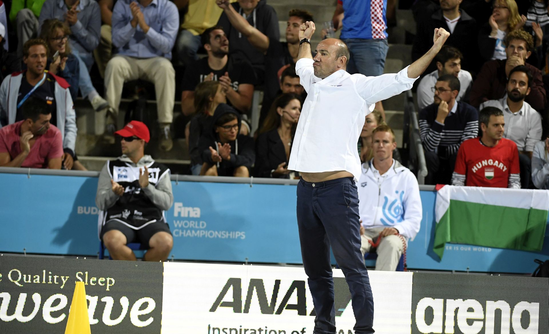 epa06109577 Head coach Ivica Tucak of Croatia celebrates his team's win at the end of the men's water polo quarterfinal match Croatia vs. Italy at the 17th FINA Swimming World Championships in Hajos Alfred National Swimming Pool in Budapest, Hungary, 25 July 2017.  EPA/Szilard Koszticsak HUNGARY OUT