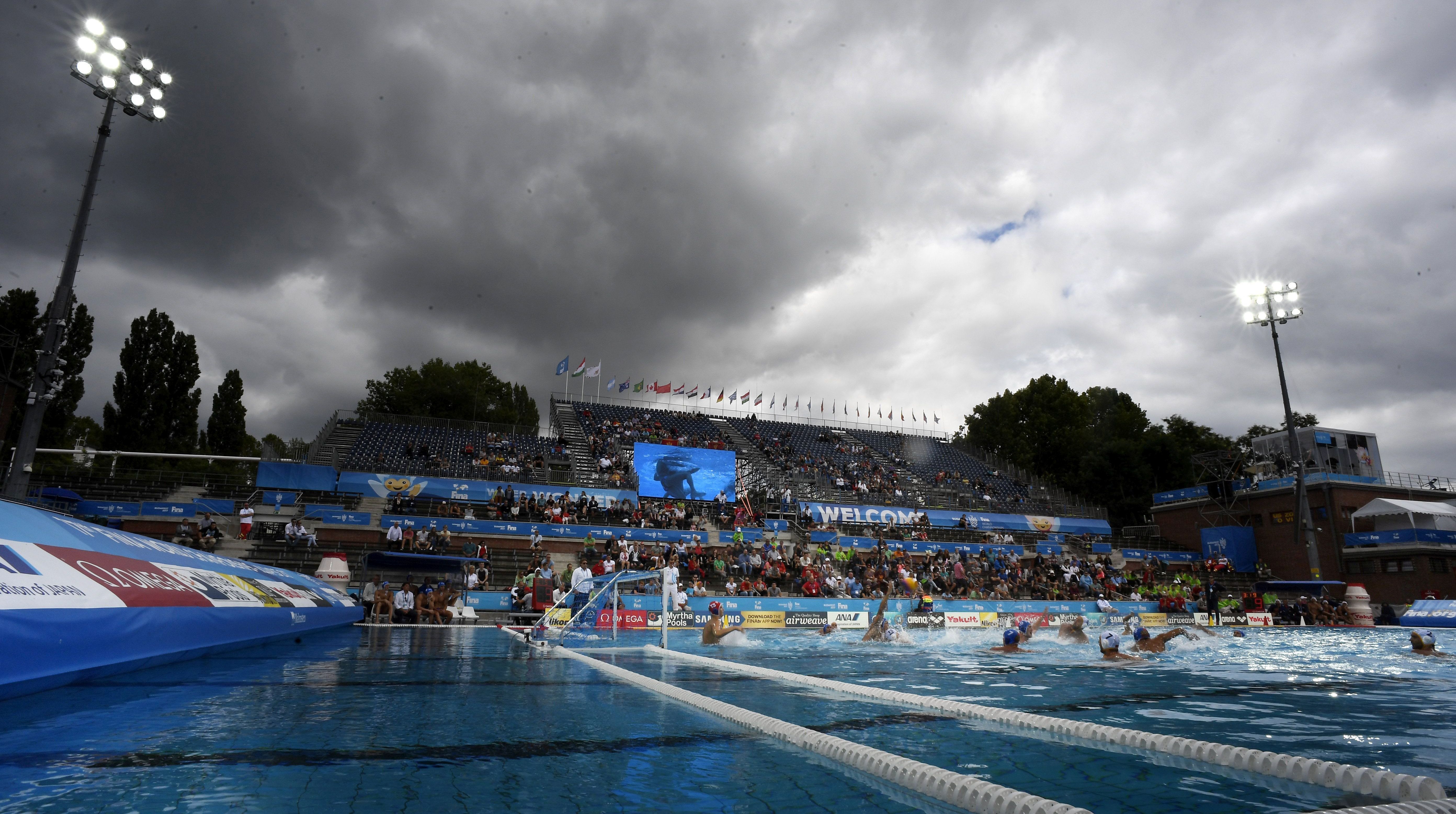 epa06112570 Storm clouds gather in the sky during the men's water polo Montenegro vs. Russia match for 5-8th place at the 17th FINA World Championships 2017 in Budapest, Hungary, 27 July 2017.  EPA/Szilard Koszticsak HUNGARY OUT
