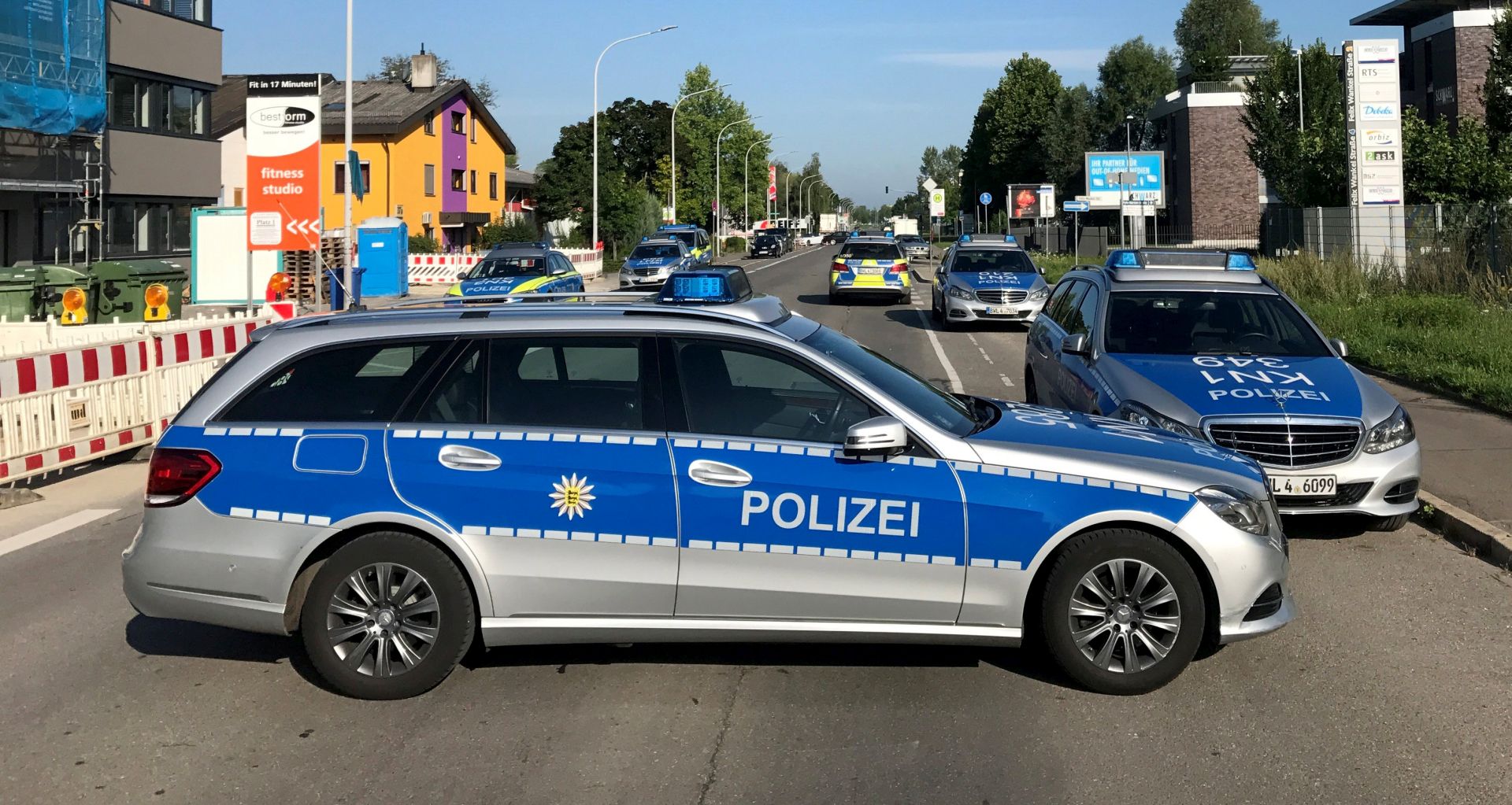 epa06117052 Police block the street leading to the night club 'Grey' in Konstanz, Germany, 30 July 2017. According to media reports, several people were injured in a shooting at the club in the early morning.  EPA/OLIVER HANSER