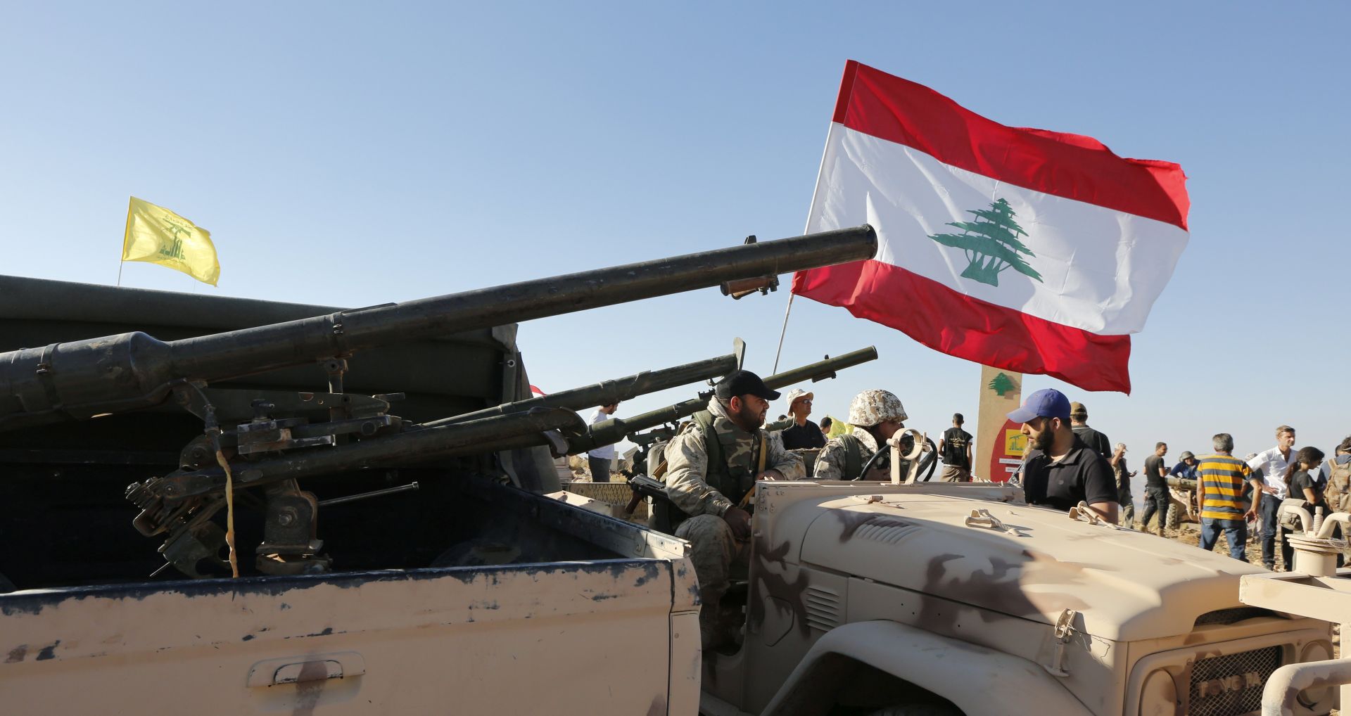 epa06116887 Hezbollah fighter in one of their position  in a mountainous area in Juroud of Arsal at the Lebanese -Syrian border 29 July 2017.  A tour for Lebanese and foreign media at the liberated positions of Al-Nusra terrorist group , guided by the media office of Hezbollah, shows their fighters along the border with Syria. A ceasefire deal has been reached, that will see Al-Nusra fighters withdraw from the Syria-Lebanon border to Idlib province in Syria , a top Lebanese official said on July 27 after a week-long of military operation there by the Hezbollah movement.  EPA/Nabil Mounzer