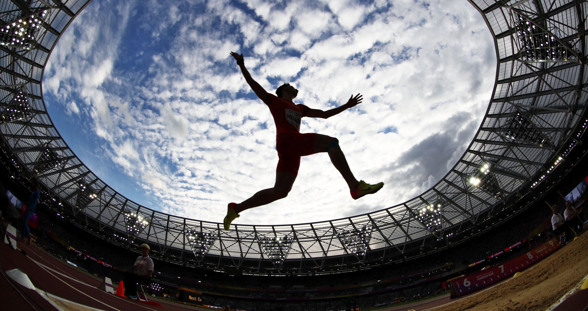 epa06125312 Changzhou Huang of China competes in the men's Long Jump qualification at the London 2017 IAAF World Championships in London, Britain, 04 August 2017.  EPA/DIEGO AZUBEL