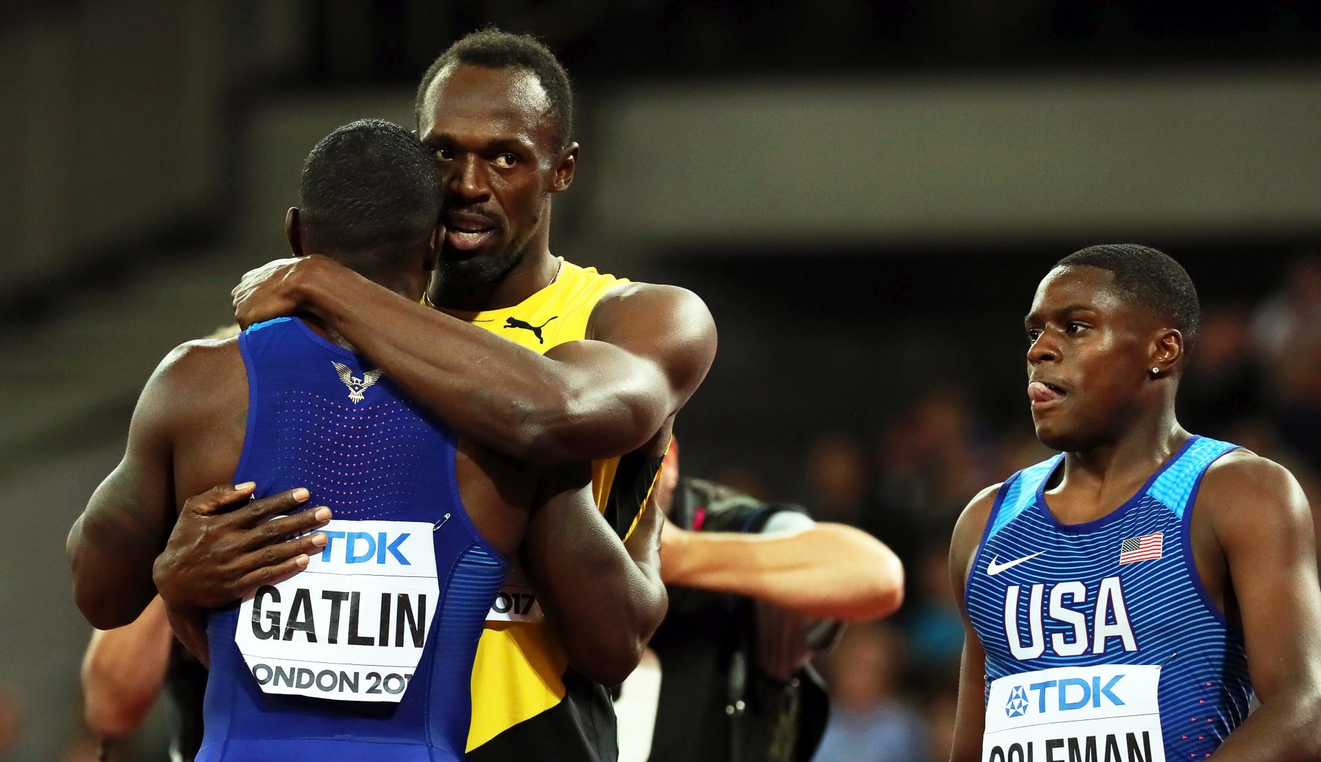 epa06127279 Justin Gatlin (L) of the USA is congratulated by third placed Usain Bolt (C) of Jamaica after winning the men's 100m final at the London 2017 IAAF World Championships in London, Britain, 05 August 2017. At right second placed Christian Coleman of the USA.  EPA/SRDJAN SUKI