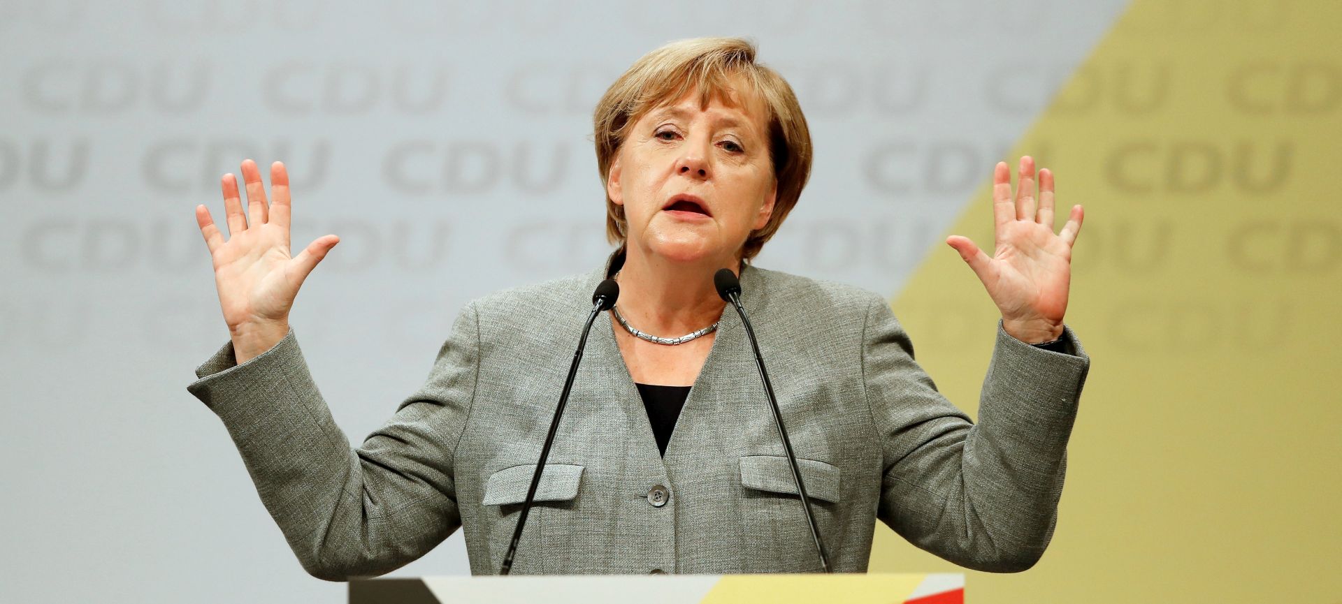 epa06139806 Germany's Christian Democratic Union (CDU) party chairwoman and German Chancellor Angela Merkel speaks during the election campaign opening event of the German Christian Democratic Union party in Dortmund, Germany, 12 August 2017. The general elections in Germany will be held on 24 September.  EPA/FRIEDEMANN VOGEL