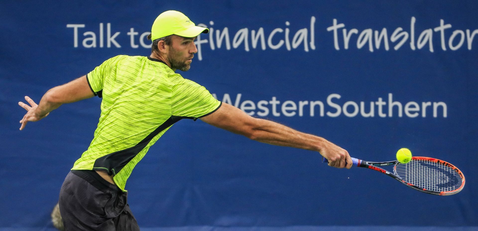 epa06149208 Ivo Karlovic of Croatia in action against Nick Kyrgios of Australia during their match at the Western & Southern Open tennis tournament at the Linder Family Tennis Center in Mason, Ohio, USA, 17 August 2017.  EPA/TANNEN MAURY
