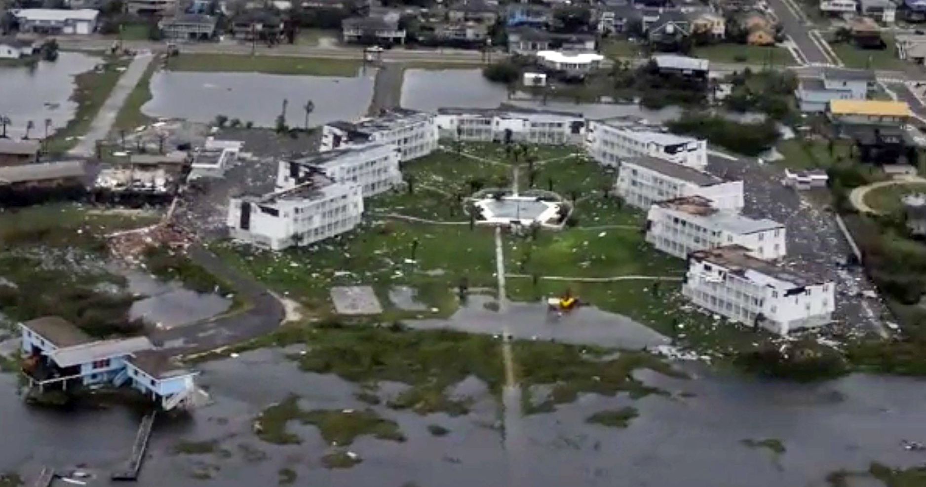 epa06168308 A handout video still image made available by US Coast Guard Air on 28 August 2017, showing damaged buildings in residential areas during an overflight from Port Aransas to Port O'Connor, Texas, USA, after Hurricane Harvey, 26 August 2017. Reports on 28 August state Houston was facing the worst storm in the Texas state history as Hurricane Harvey brought a massive amount of 30 inches, or 75 cm of rain as it passed through the area. Punts are small boats teams that respond to floods or natural disasters.  EPA/USCG JOHANNA STRICKLAND HANDOUT  HANDOUT EDITORIAL USE ONLY
