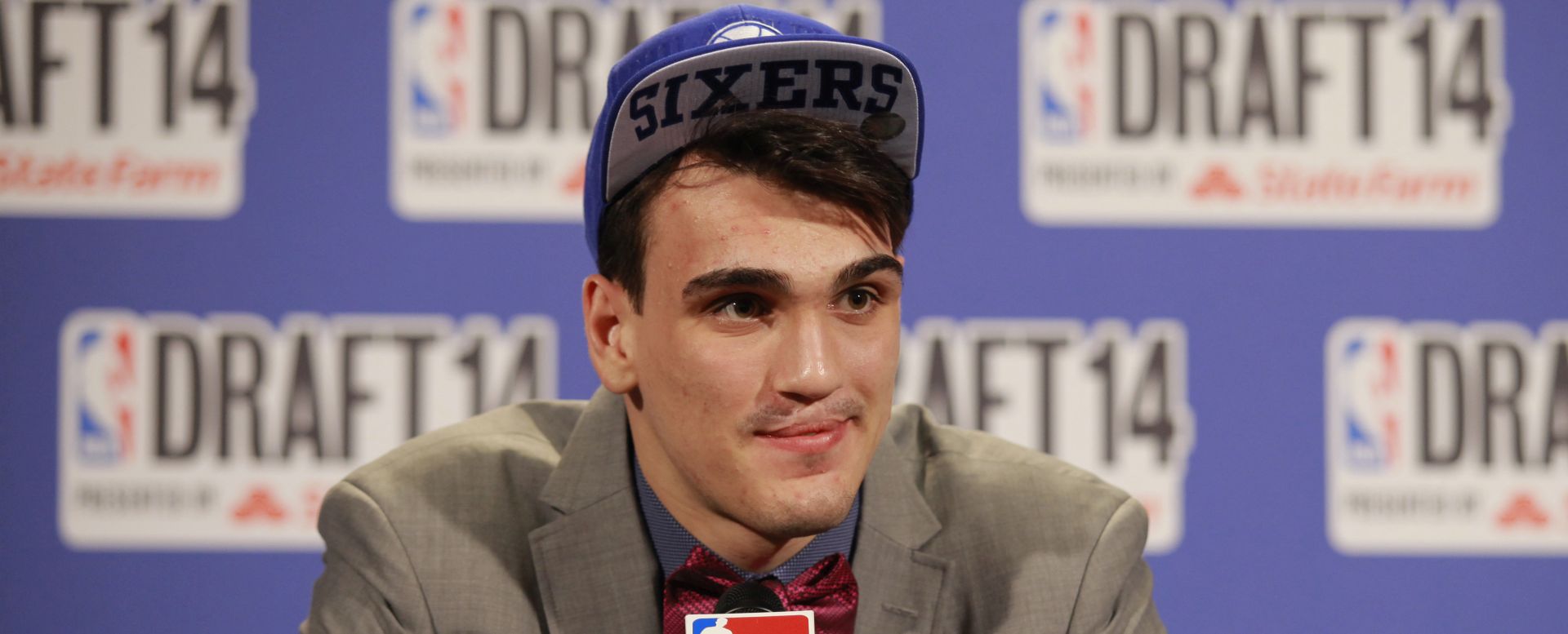NEW YORK - JUNE 26: Dario Saric addresses the media after being selected 12th overall by the Orlando Magic later traded to the Philadelphia 76ers during the 2014 NBA Draft on June 26, 2014 at the Barclays Center in Brooklyn, New York. NOTE TO USER: User expressly acknowledges and agrees that, by downloading and/or using this photograph, user is consenting to the terms and conditions of the Getty Images License Agreement.  Mandatory Copyright Notice: Copyright 2014 NBAE (Photo by Jeyhoun Allebaugh/NBAE via Getty Images)