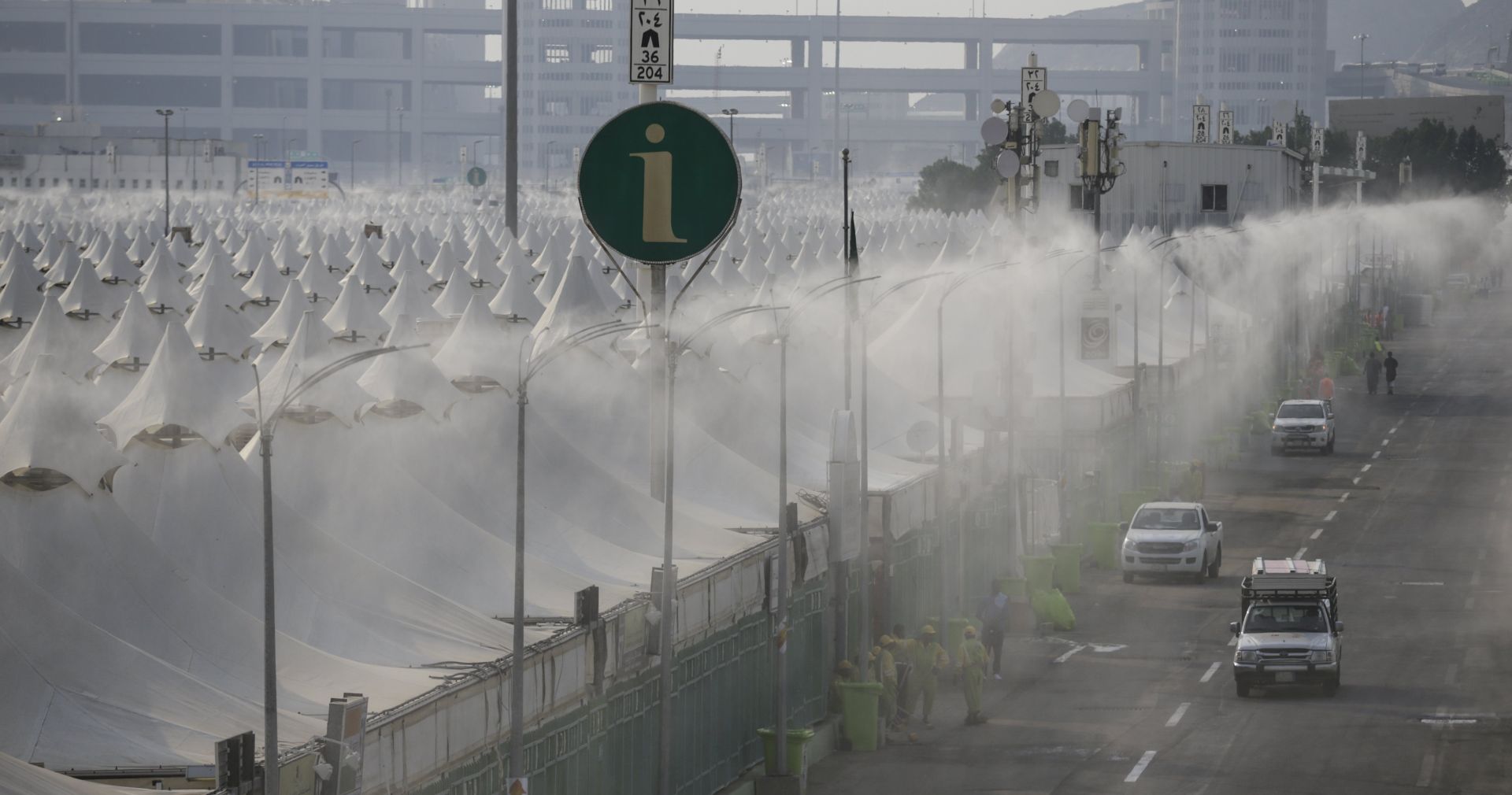 epa06170886 Water is sprayed to cool down the heat ahead of Hajj in the tent city of Mina, Saudi Arabia, 29 August 2017. Around 2.6 million muslim are expected to attend this year's Hajj pilgrimage, which is highlighted by the Day of Arafah, one day prior to Eid al-Adha. Eid al-Adha is the holiest of the two Muslims holidays celebrated each year, it marks the yearly Muslim pilgrimage (Hajj) to visit Mecca, the holiest place in Islam. Muslims slaughter a sacrificial animal and split the meat into three parts, one for the family, one for friends and relatives, and one for the poor and needy.  EPA/MAST IRHAM