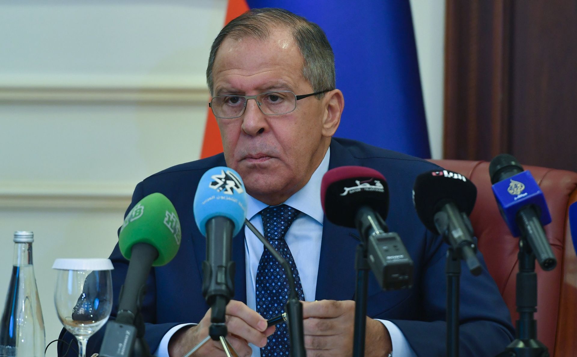 epa06171896 Russian Foreign Minister Sergei Lavrov speaks during a joint press conference with Qatari Foreign Minister Sheikh Mohammed bin Abdulrahman Al-Thani (not pictured) after their meeting at the ministry of foreign affairs in Doha- Qatar, 30 August 2017.  EPA/Noushad Thekkayil