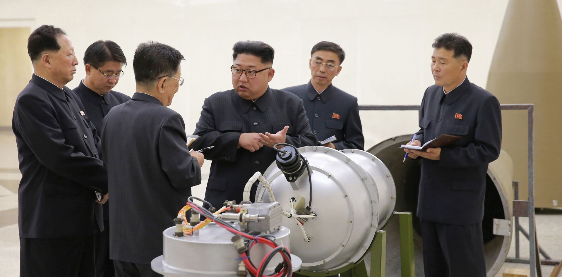 epa06180303 An undated photo released by the North Korean Central News Agency (KCNA), the state news agency of North Korea, on 03 September 2017 shows Kim Jong-un (3-R), chairman of the Workers' Party of Korea, chairman of the State Affairs Commission of the Democratic People's Republic of Korea (DPRK) and supreme commander of the Korean People's Army (KPA), purportedly guiding the work for nuclear weaponization on spot, at an undisclosed location, North Korea. According to KCNA, the North Korean leader watched an H-bomb (hydrogen bomb), a multi-functional thermonuclear nuke with great destructive power, to be loaded into an intercontinental ballistic missile (ICBM).  EPA/KCNA   EDITORIAL USE ONLY