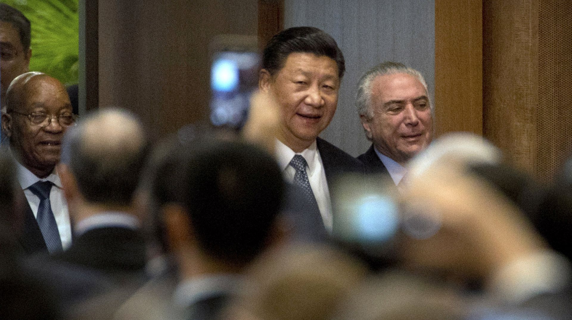 epa06180574 (L-R) South African President Jacob Zuma, Chinese President Xi Jinping and Brazilian President Michel Temer arrive for the opening ceremony of the BRICS Business Forum at the Xiamen International Conference and Exhibition Center in Xiamen in southeastern China's Fujian Province, 03 September 2017. The ninth BRICS (Brazil, Russia, India, China and South Africa) Summit in Xiamen runs from 03 to 04 September.  EPA/Mark Schiefelbein / POOL Pool Photo